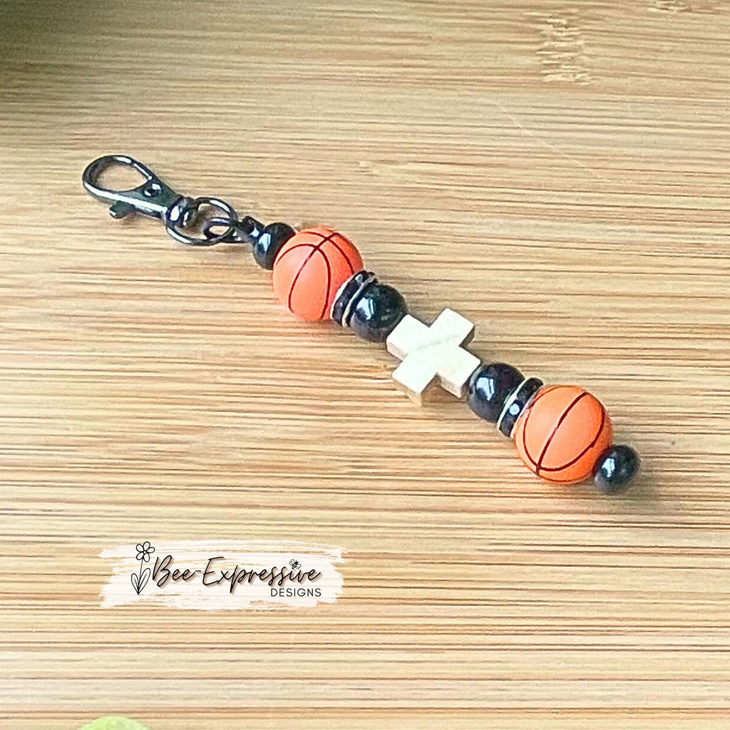 Handmade, silicone basketball, keychain!  Swivel clasp, metal bead bar, acrylic beads, rhinestones, wood cross bead!