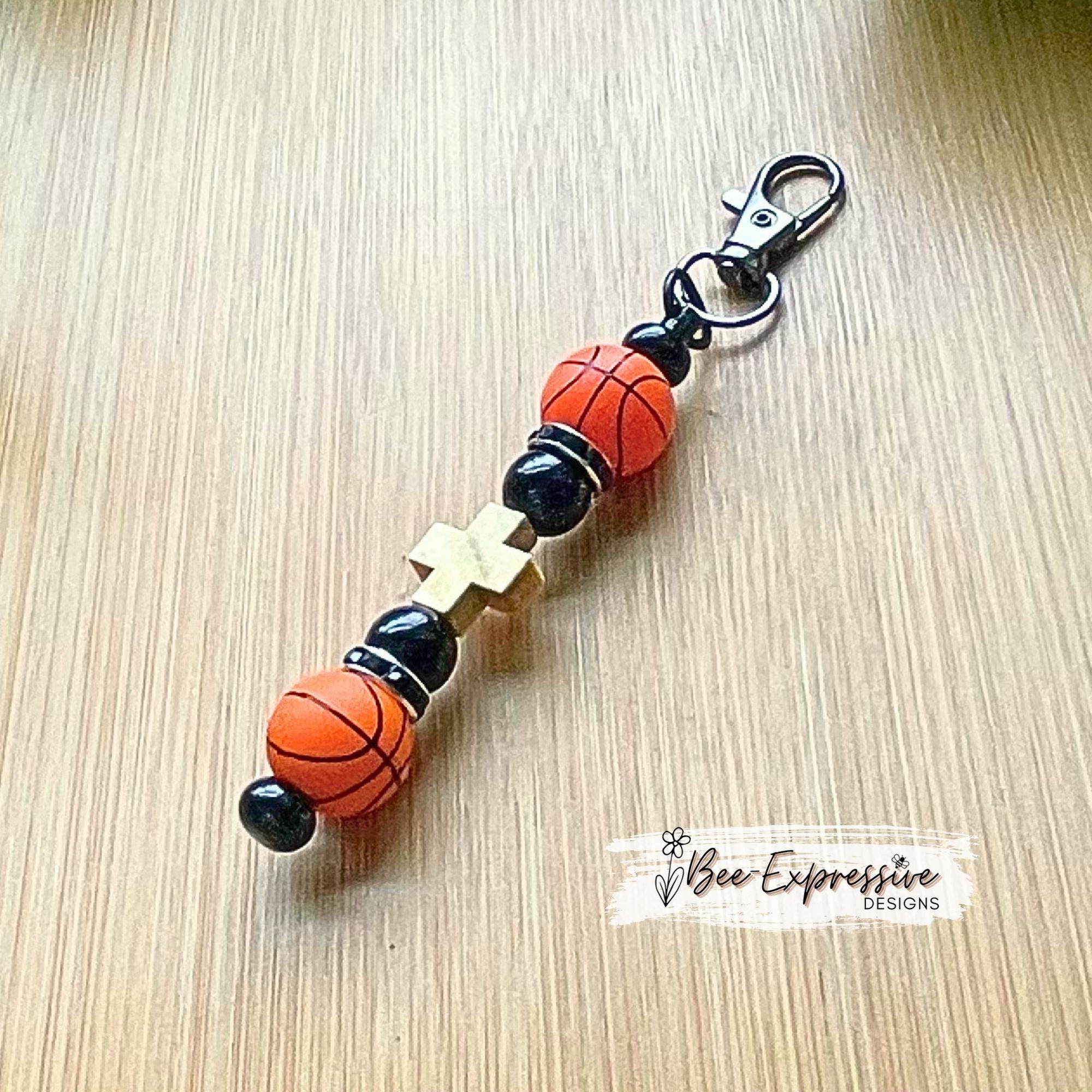 Handmade, silicone basketball, keychain!  Swivel clasp, metal bead bar, acrylic beads, rhinestones, wood cross bead!