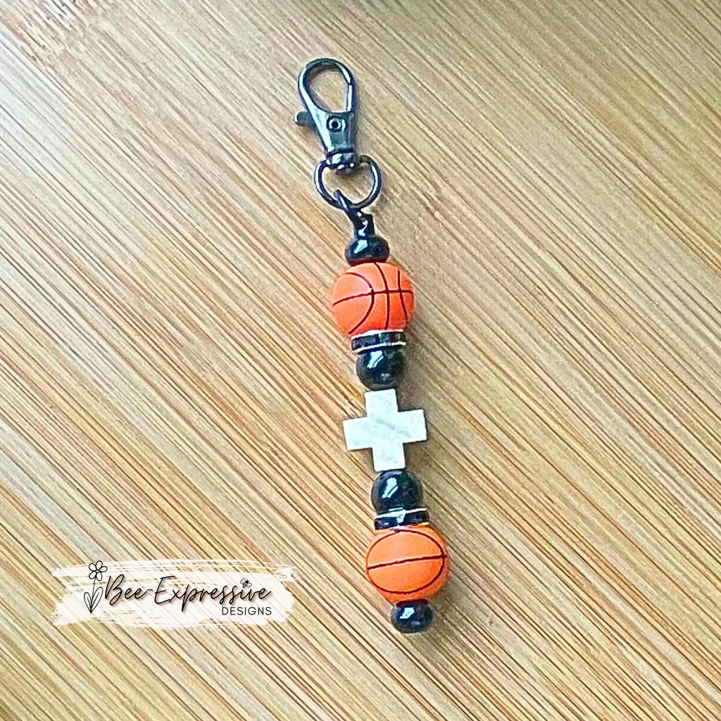 Handmade, silicone basketball, keychain!  Swivel clasp, metal bead bar, acrylic beads, rhinestones, wood cross bead!
