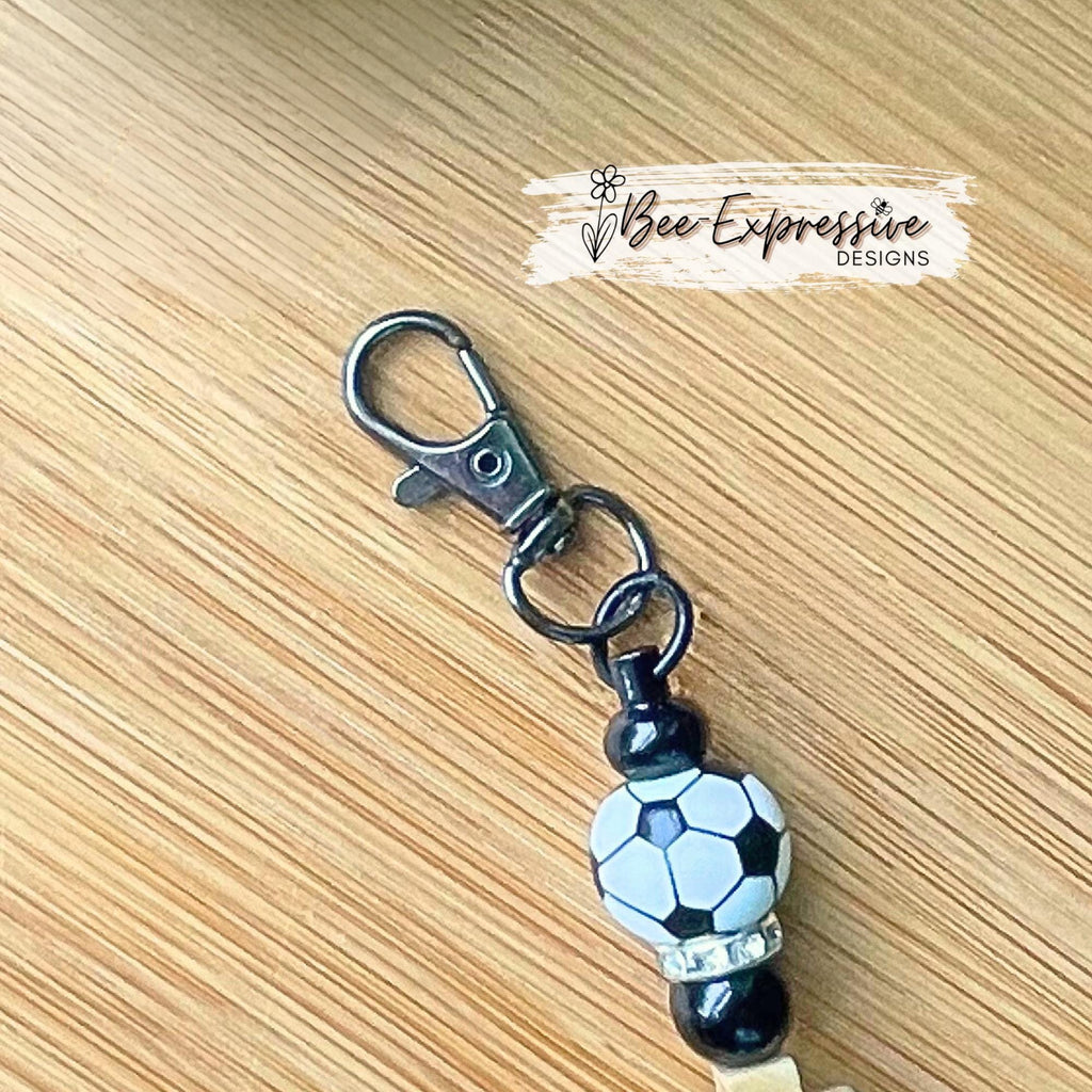 Handmade, silicone SOCCER keychain!  Swivel clasp, bead bar, soccer ball beads, wood cross bead, round acrylic beads, rhinestone spacers