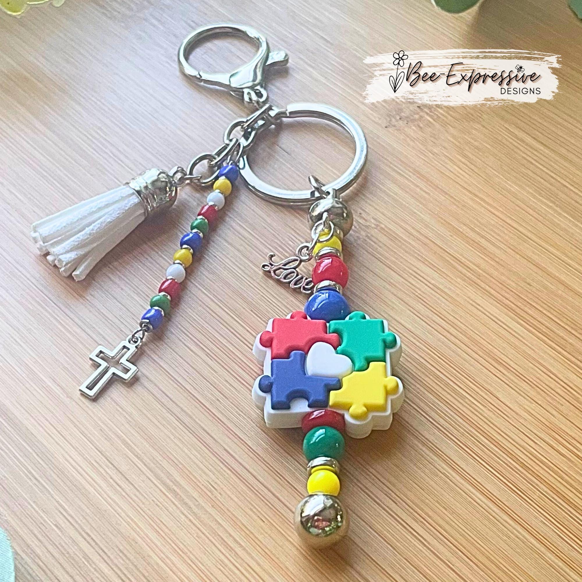 Beaded, autism awareness keychain! Lobster claw or swivel clasp, silver spacers, acrylic beads, beaded acrylic tassel, cross and love charms