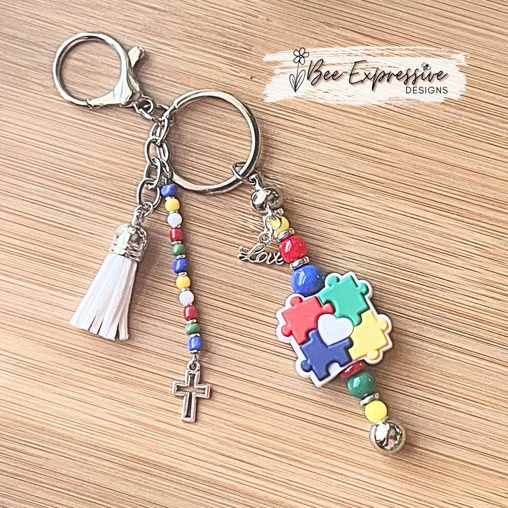Beaded, autism awareness keychain! Lobster claw or swivel clasp, silver spacers, acrylic beads, beaded acrylic tassel, cross and love charms