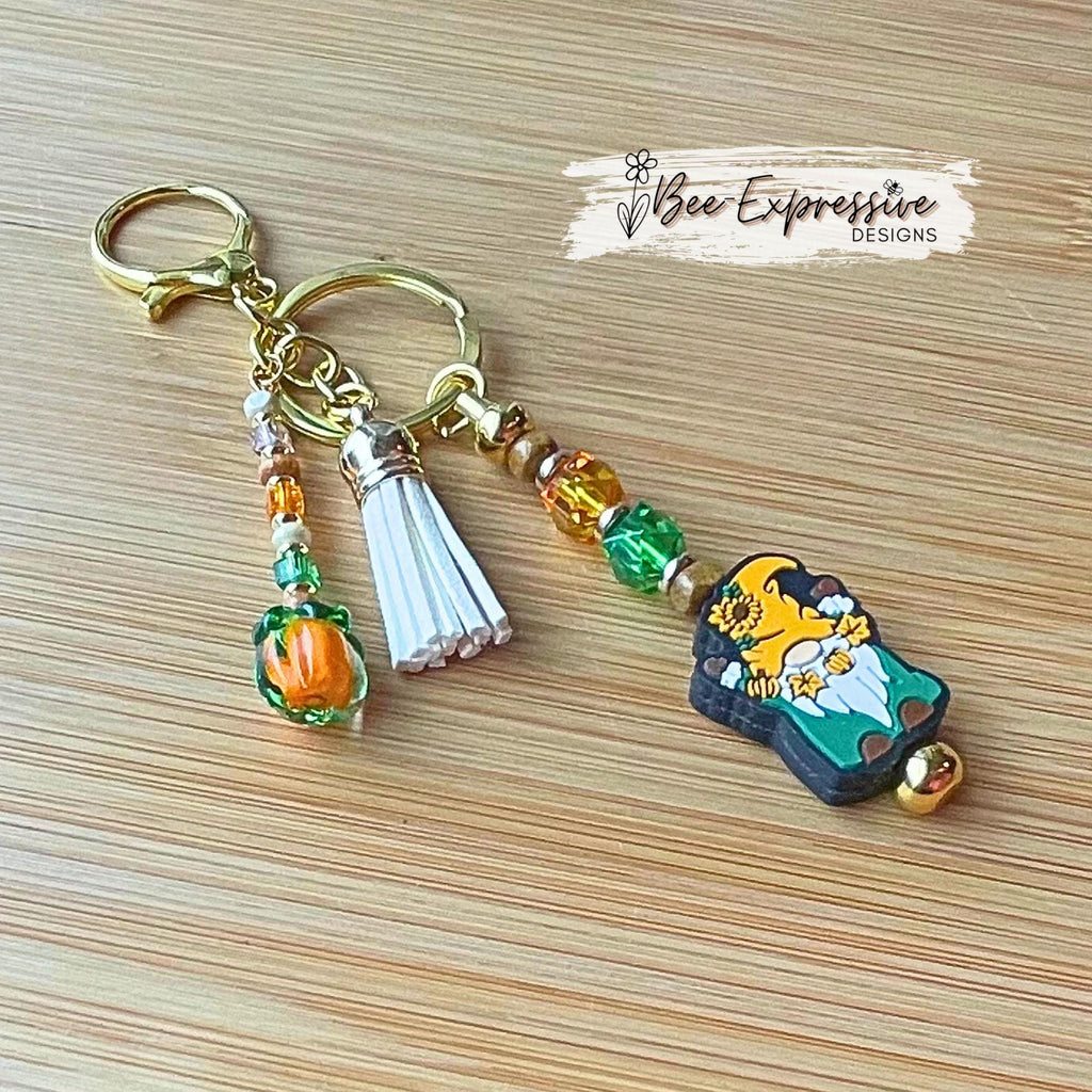 Handmade, beaded, GNOME fall or autumn keychain! Lobster or swivel clasp, bead bar, acrylic beads, beaded tassel with a glass pumpkin charm!
