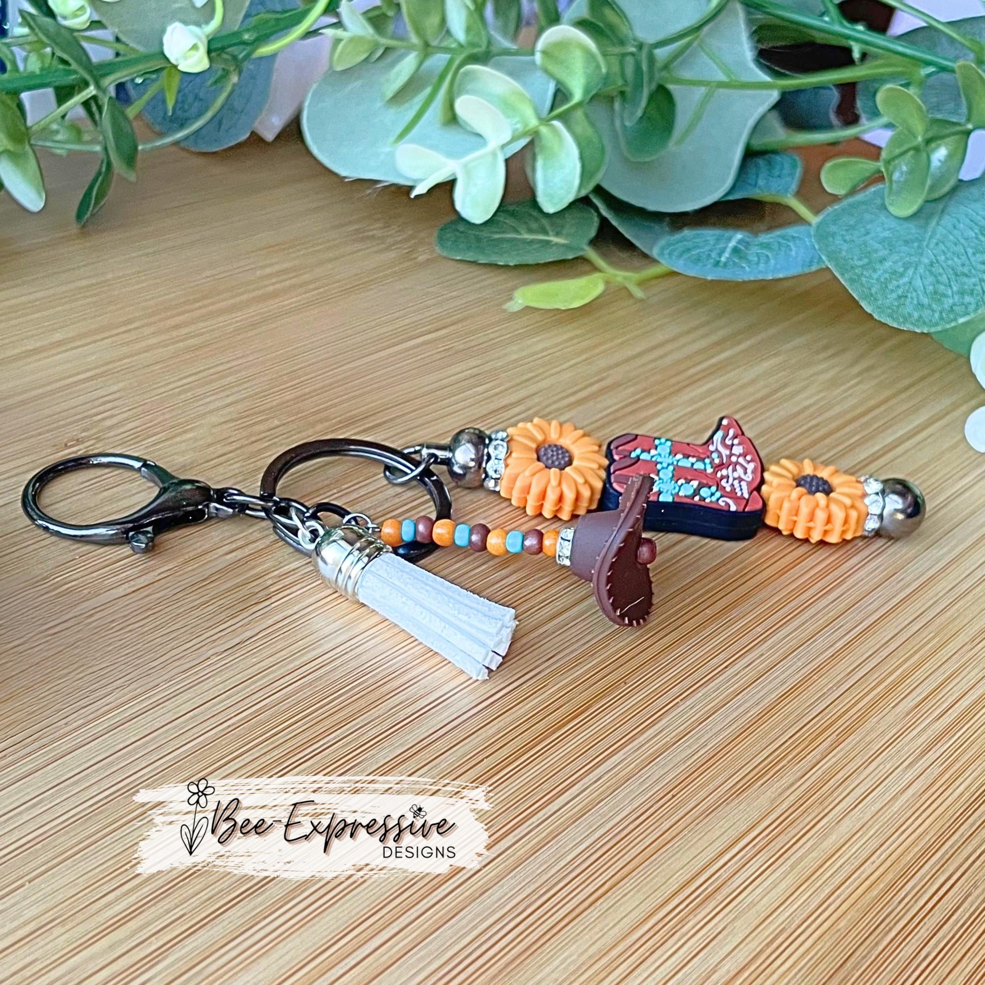 Handmade, beaded, BOOT & SUNFLOWER metal keychain!  Lobster clasp, acrylic beaded tassel, silicone western hat, cowboy, cowgirl, flowers!