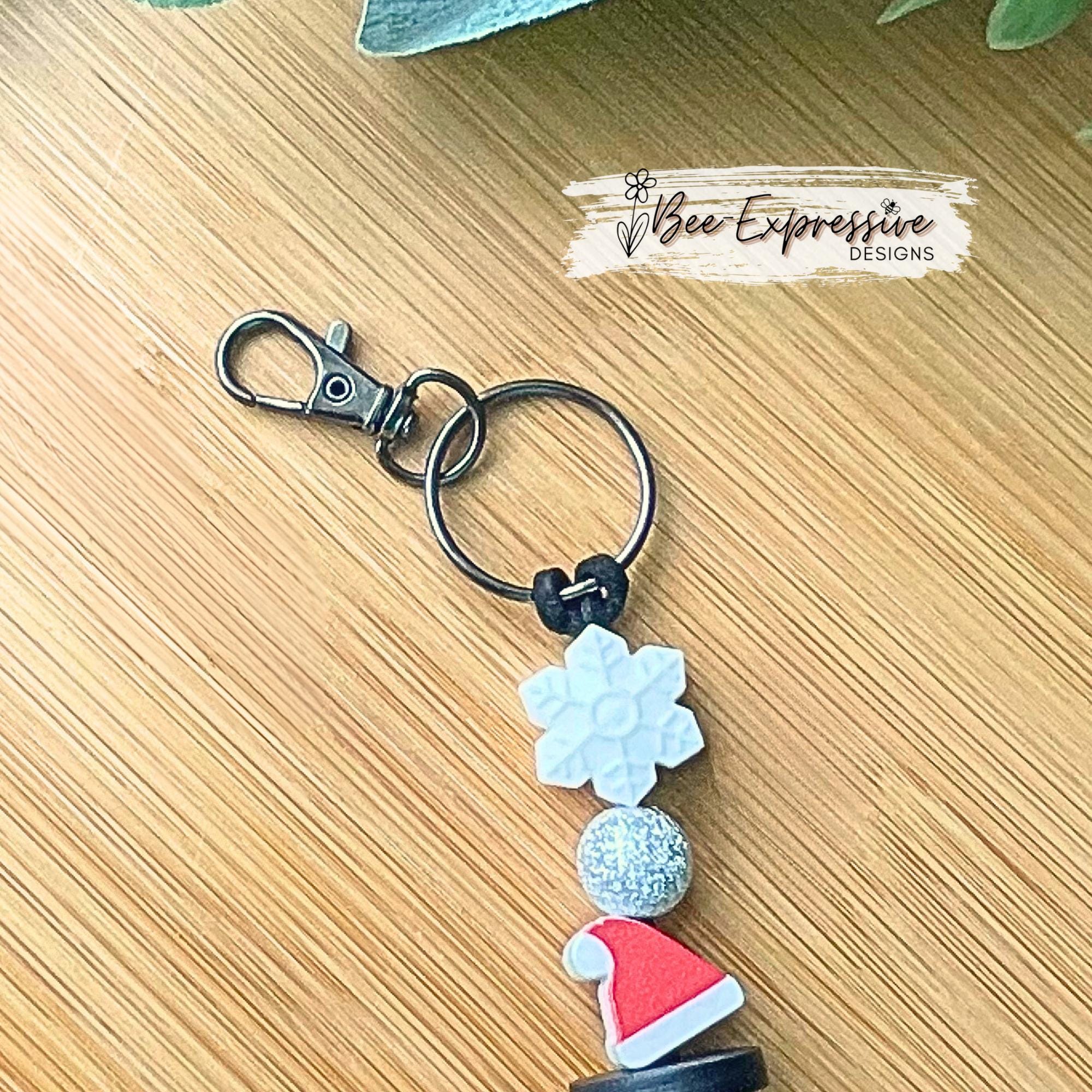 Adorable, handmade, Christmas WOOD snowman keychain! Lobster swivel clasp, keyring, suede cord, printed wood beads, silicone snowflake beads