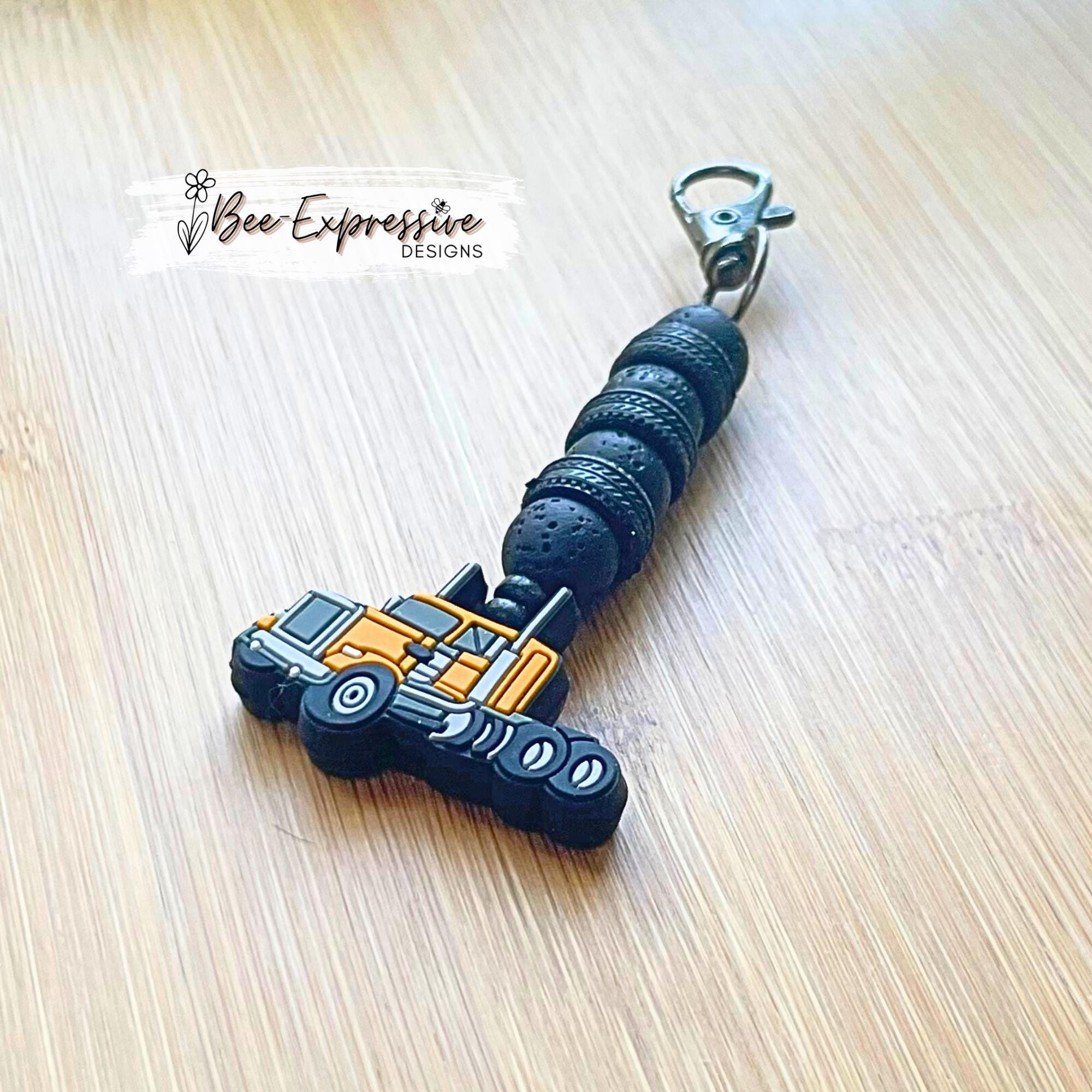 Handmade, beaded, SEMI TRUCK chain! Swivel clasp, 1cm elastic string, volcanic round beads, truck focal bead, toy tire spacers!