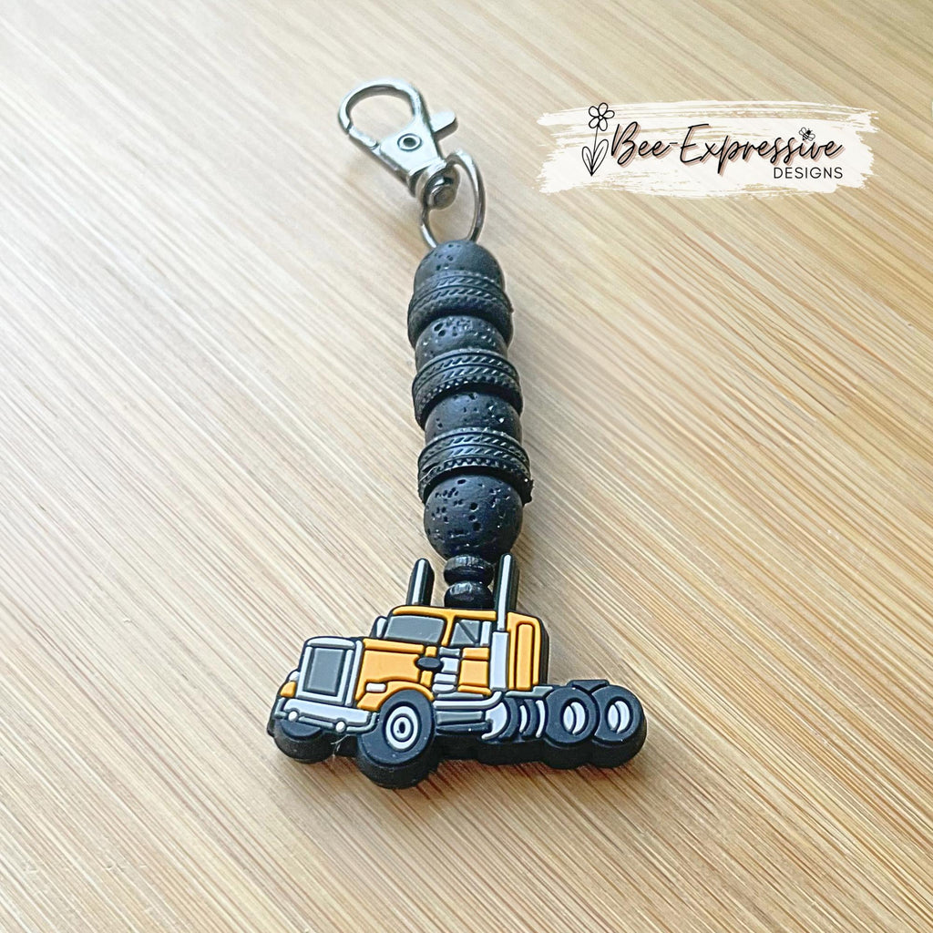Handmade, beaded, SEMI TRUCK chain! Swivel clasp, 1cm elastic string, volcanic round beads, truck focal bead, toy tire spacers!