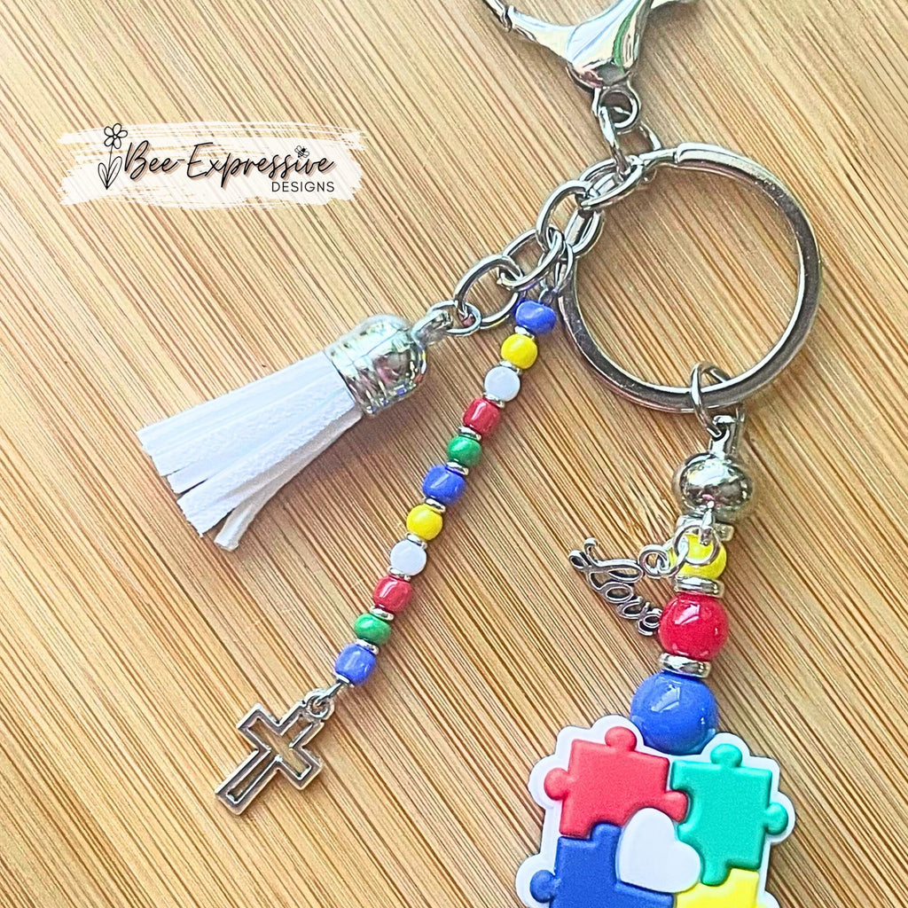 Beaded, autism awareness keychain! Lobster claw or swivel clasp, silver spacers, acrylic beads, beaded acrylic tassel, cross and love charms