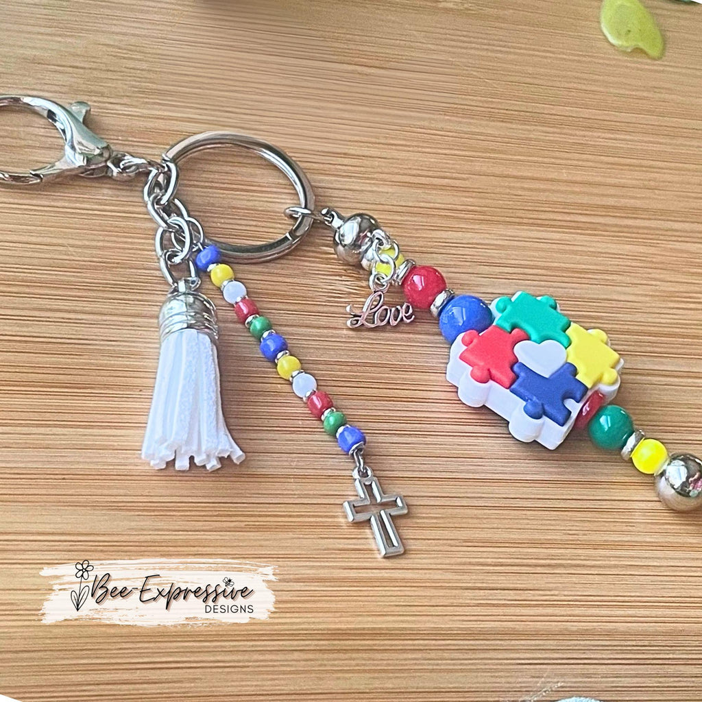 Beaded, autism awareness keychain! Lobster claw or swivel clasp, silver spacers, acrylic beads, beaded acrylic tassel, cross and love charms