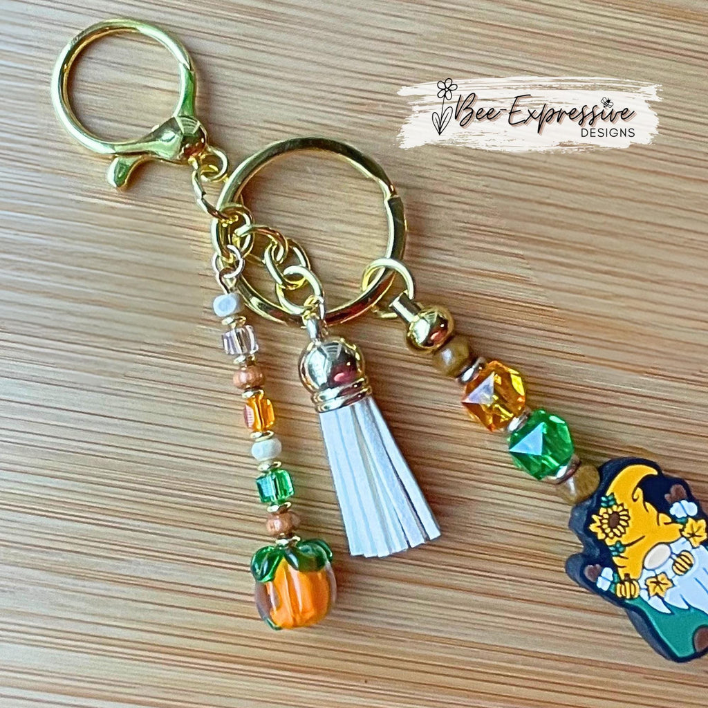 Handmade, beaded, GNOME fall or autumn keychain! Lobster or swivel clasp, bead bar, acrylic beads, beaded tassel with a glass pumpkin charm!