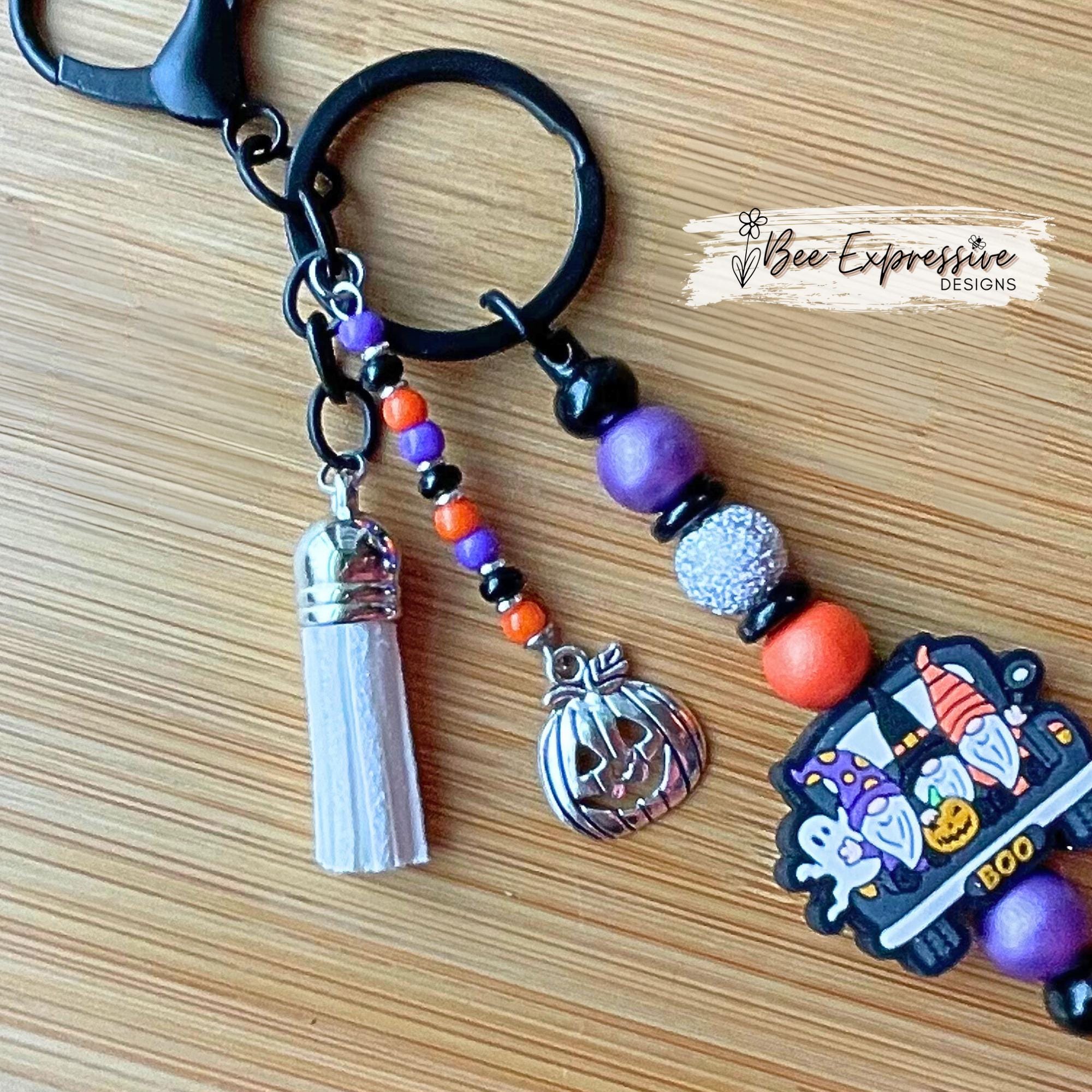 Handmade, unique, silicone HALLOWEEN gnome keychain! Lobster clasp, beaded bar, wood beads, acrylic spacers, beaded tassel, pumpkin charm
