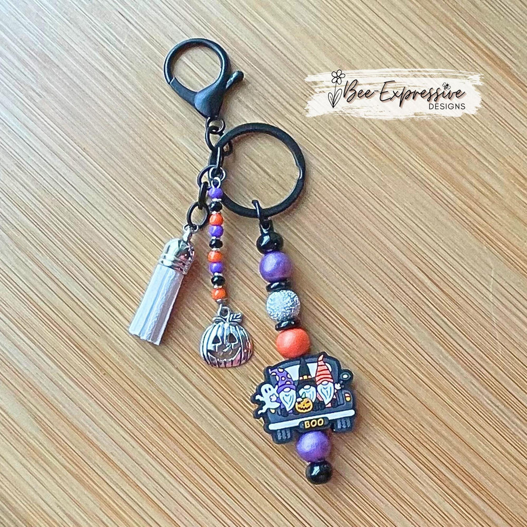 Handmade, unique, silicone HALLOWEEN gnome keychain! Lobster clasp, beaded bar, wood beads, acrylic spacers, beaded tassel, pumpkin charm