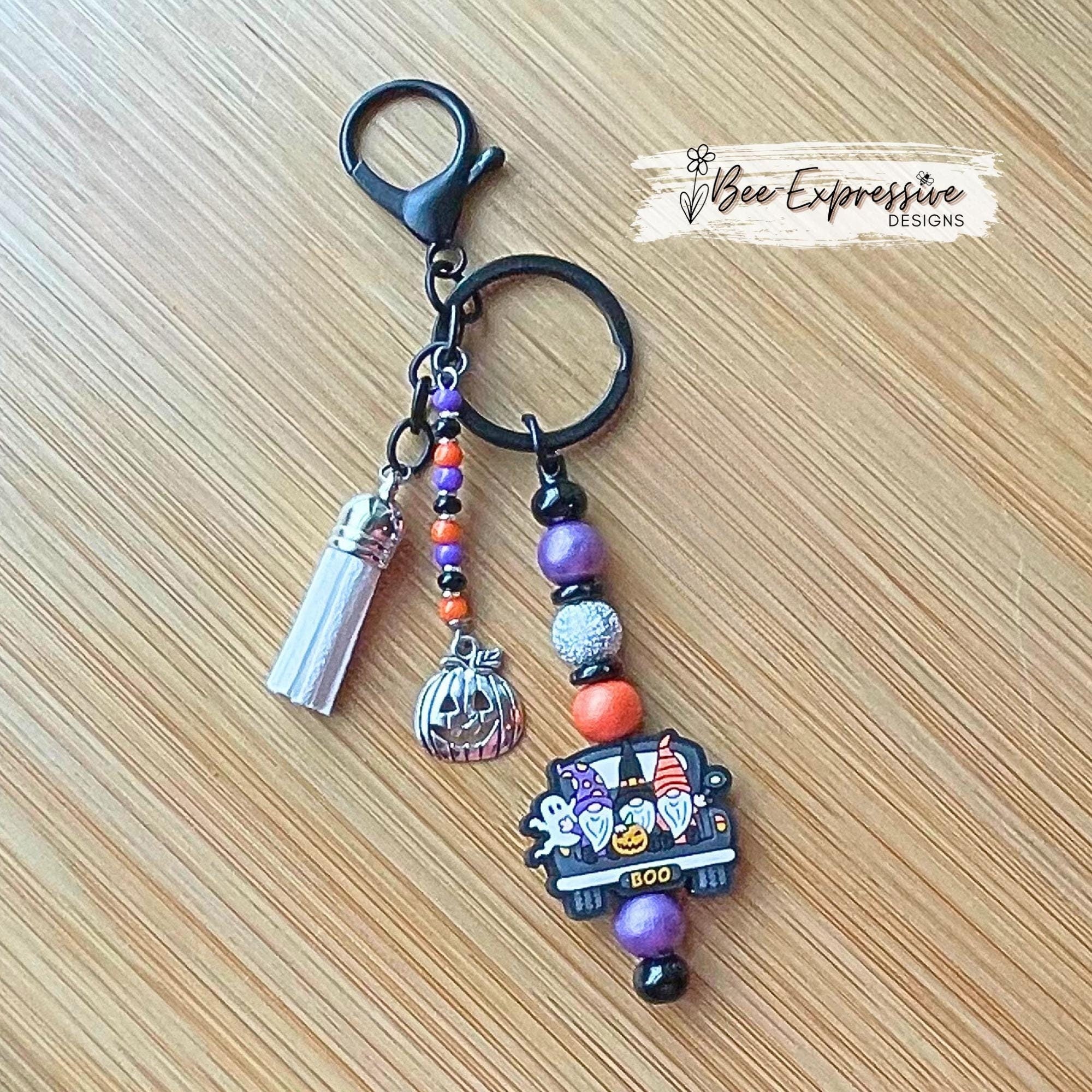 Handmade, unique, silicone HALLOWEEN gnome keychain! Lobster clasp, beaded bar, wood beads, acrylic spacers, beaded tassel, pumpkin charm