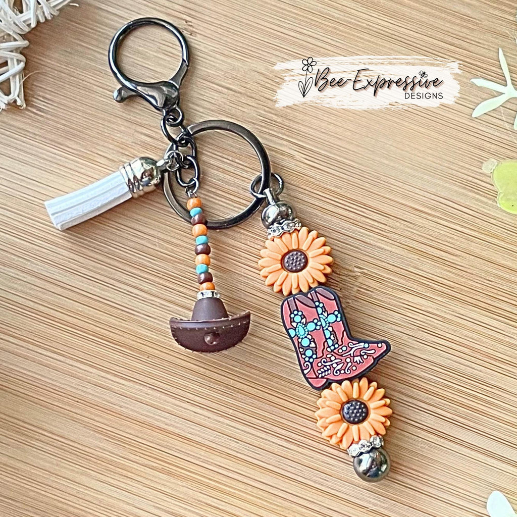 Handmade, beaded, BOOT & SUNFLOWER metal keychain!  Lobster clasp, acrylic beaded tassel, silicone western hat, cowboy, cowgirl, flowers!