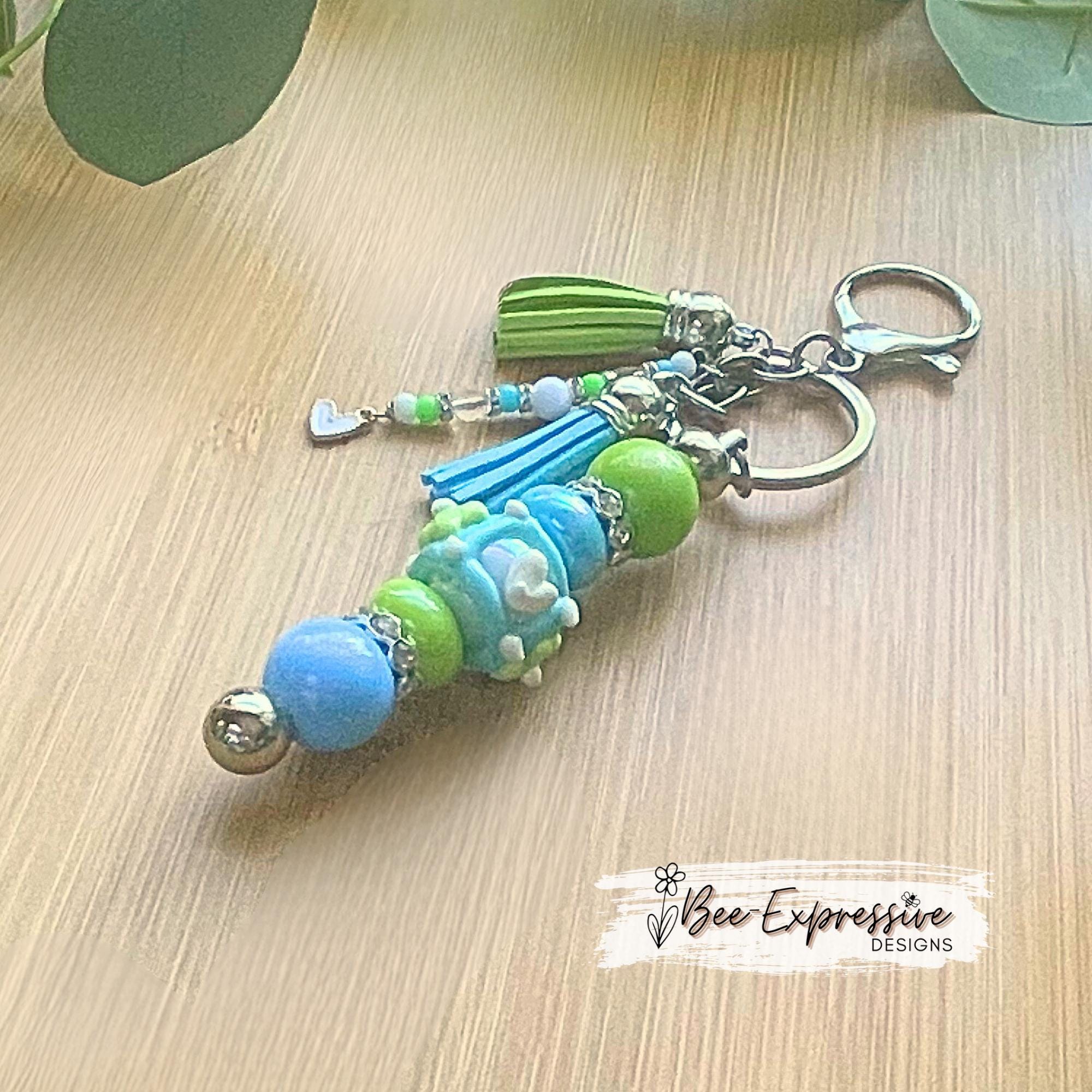 Beautiful, handmade iridescent keychain! Lobster clasp, keyring, bar, lampwork bead, rhinestone spacers, acrylic, beaded tassel, heart charm