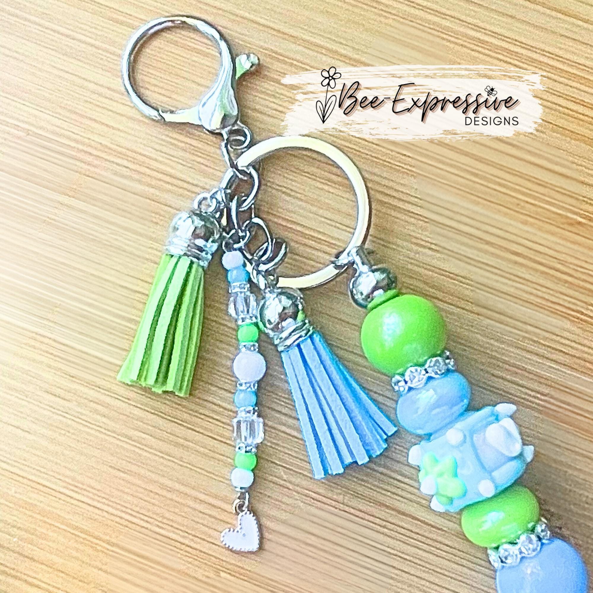 Beautiful, handmade iridescent keychain! Lobster clasp, keyring, bar, lampwork bead, rhinestone spacers, acrylic, beaded tassel, heart charm