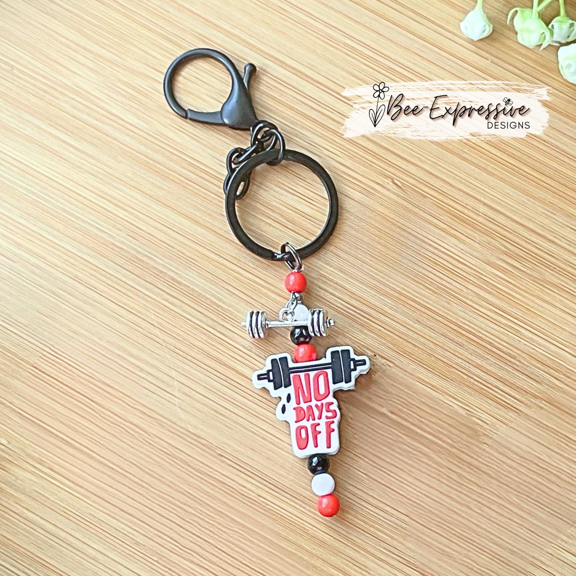 Handmade and unique, WEIGHTLIFTING, work out keychain!  Black lobster clasp, keyring, silicone focal bead, dumbbell charm, acrylic beads