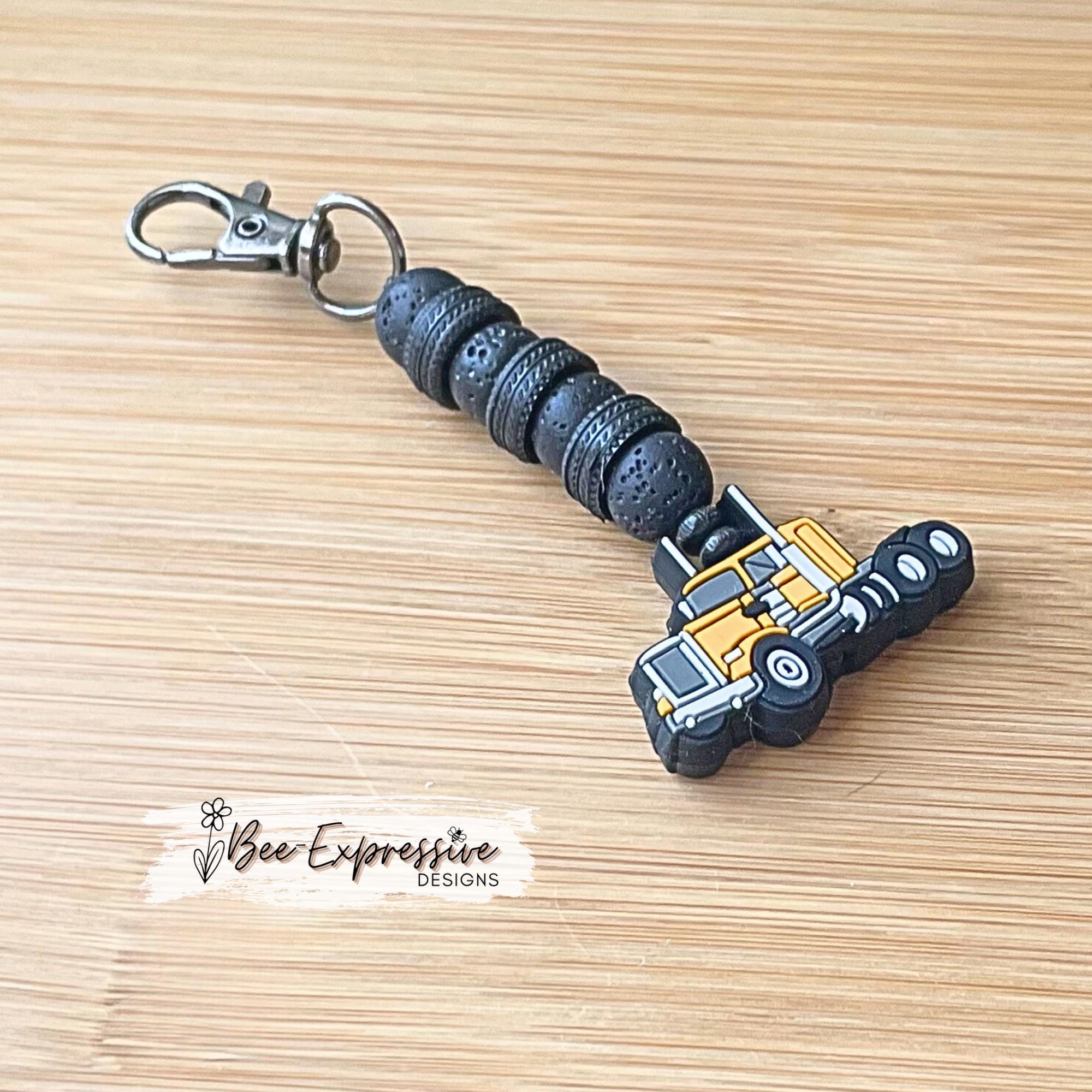 Handmade, beaded, SEMI TRUCK chain! Swivel clasp, 1cm elastic string, volcanic round beads, truck focal bead, toy tire spacers!