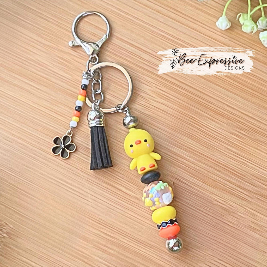 Adorable, handmade 3D DUCK keychain! Lobster clasp, metal, lentils, rhinestone spacer, painted glass bead, beaded tassel with flower charm!