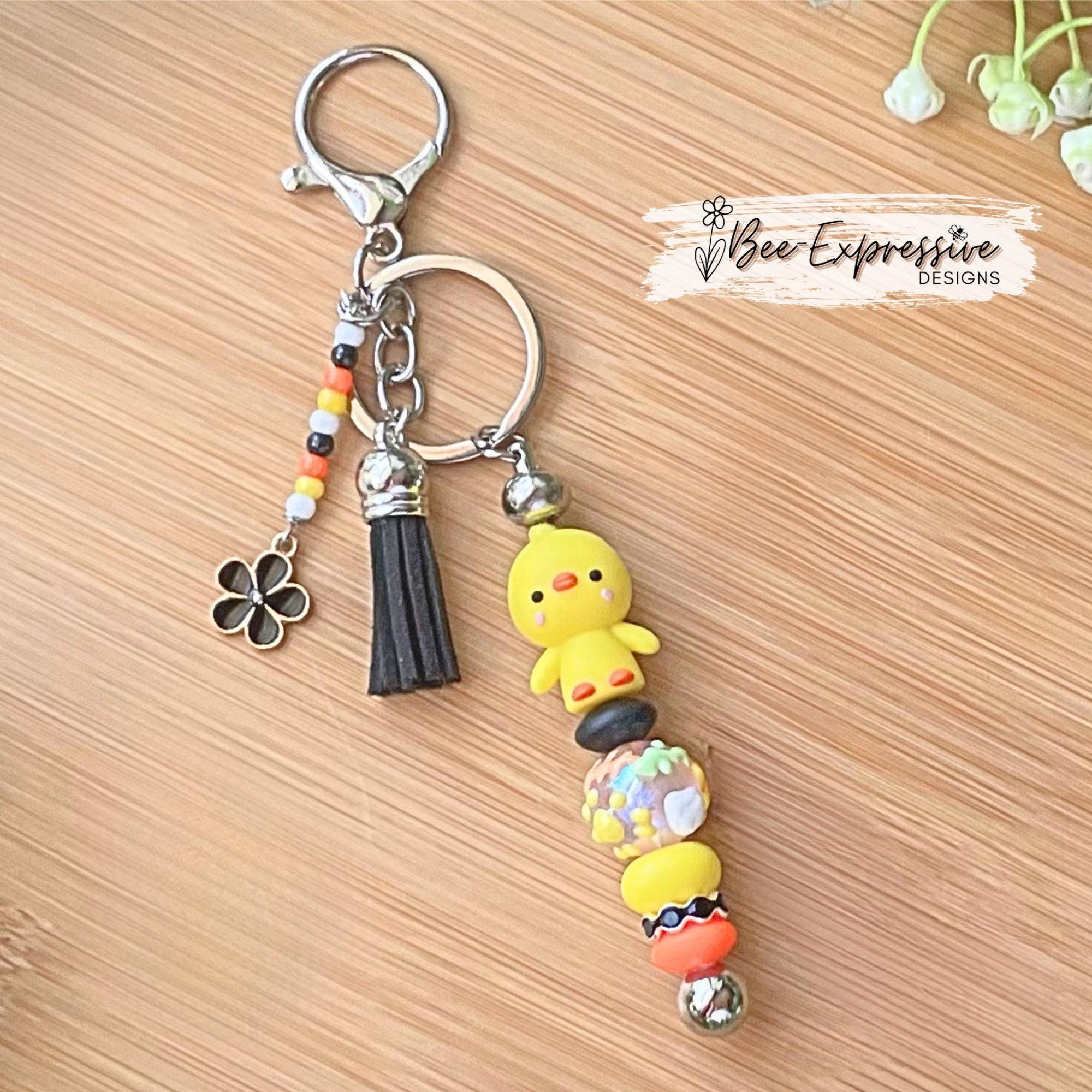 Adorable, handmade 3D DUCK keychain! Lobster clasp, metal, lentils, rhinestone spacer, painted glass bead, beaded tassel with flower charm!