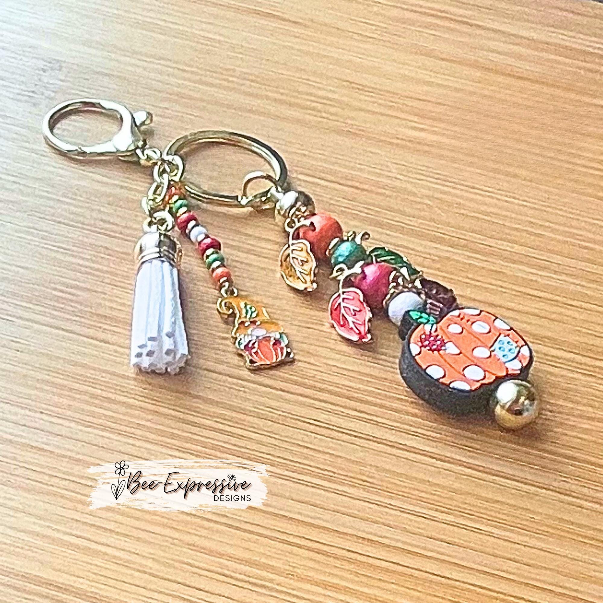 Handmade, patchwork PUMPKIN & GNOME charm, keychain! Lobster clasp, bead bar, wood beads, leaf charms, beaded tassel with a fall gnome charm