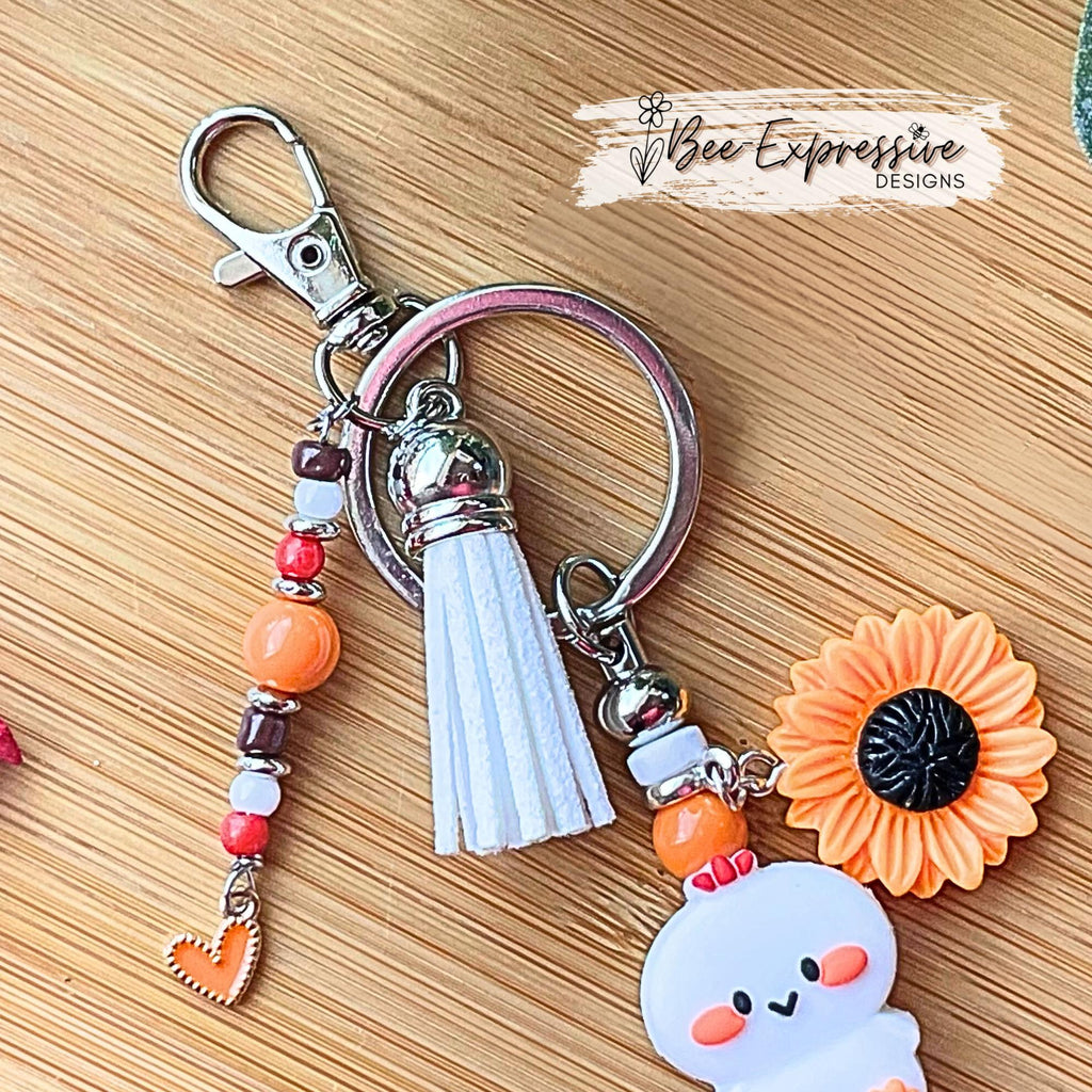 Handmade, silicone CHICKEN keychain! Lobster or swivel clasp, bead bar, acrylic, flower charm, spacers, beaded tassel with a heart charm!