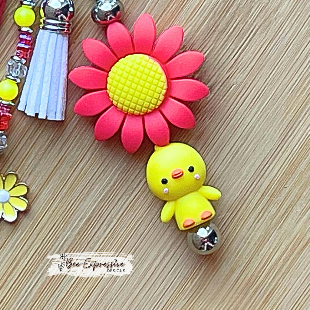 Handmade, silicone 3D DUCK & SUNFLOWER keychain! Lobster clasp, bead bar, acrylic beaded tassel with square beads and a yellow daisy charm!