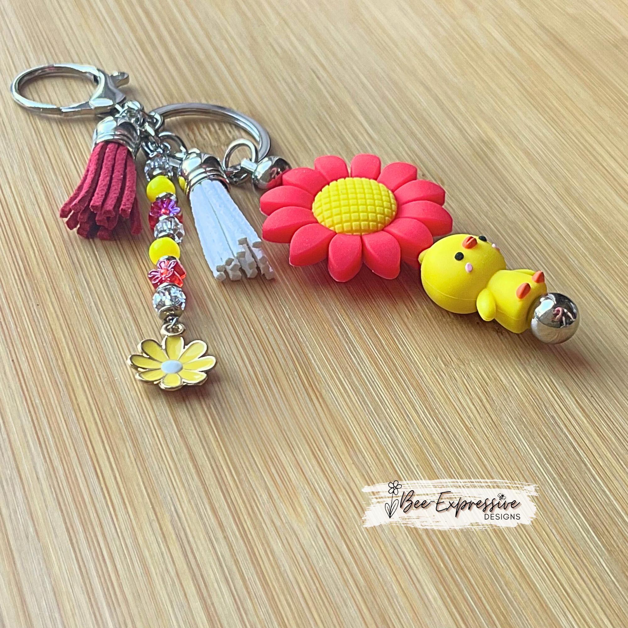 Handmade, silicone 3D DUCK & SUNFLOWER keychain! Lobster clasp, bead bar, acrylic beaded tassel with square beads and a yellow daisy charm!