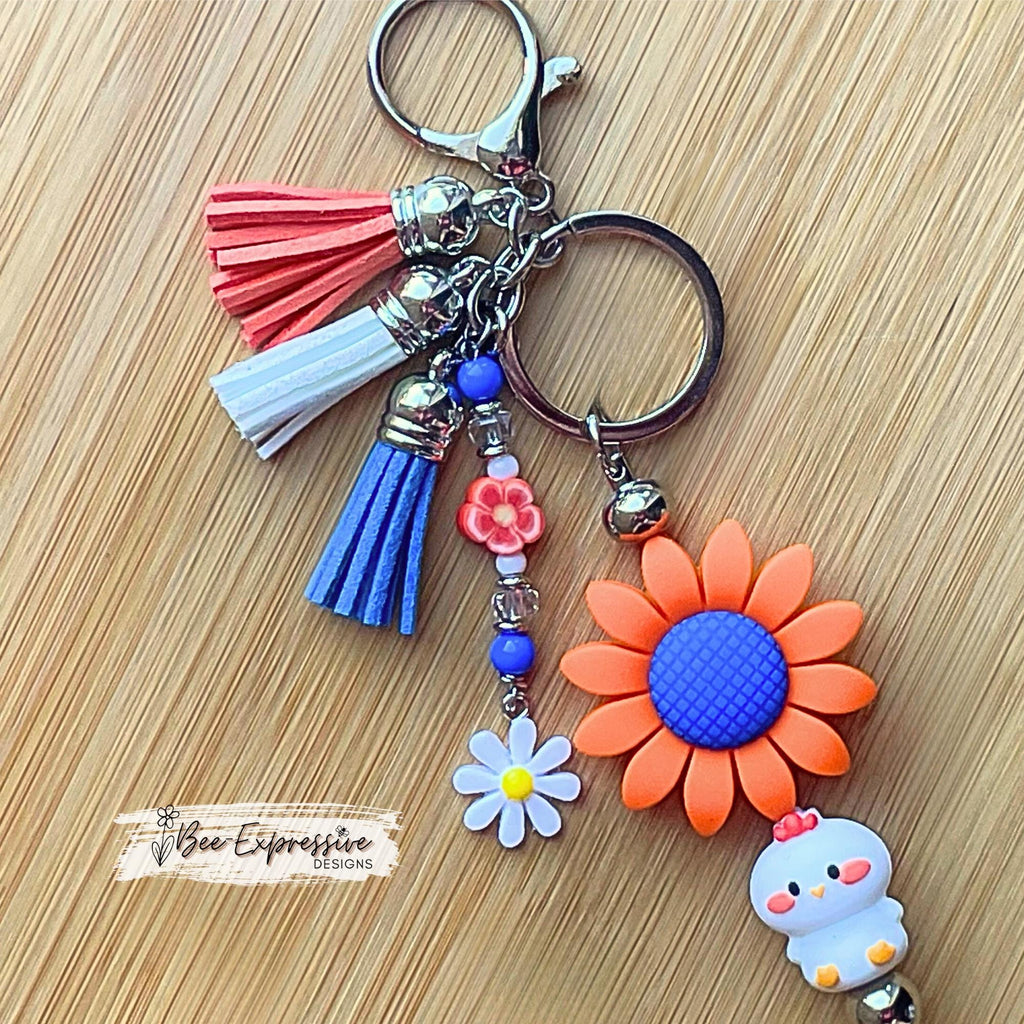 Handmade, silicone CHICKEN and DAISY flower keychain! Lobster or swivel clasp, bead bar, beaded tassel with a white daisy charm, 3 tassels