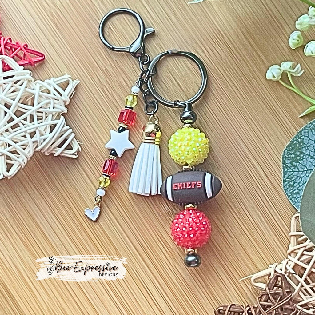 Handmade, FOOTBALL beaded keychain! Silicone football bead says CHIEFS, acrylic chunky beads, gold spacers, beaded tassel, star, heart charm