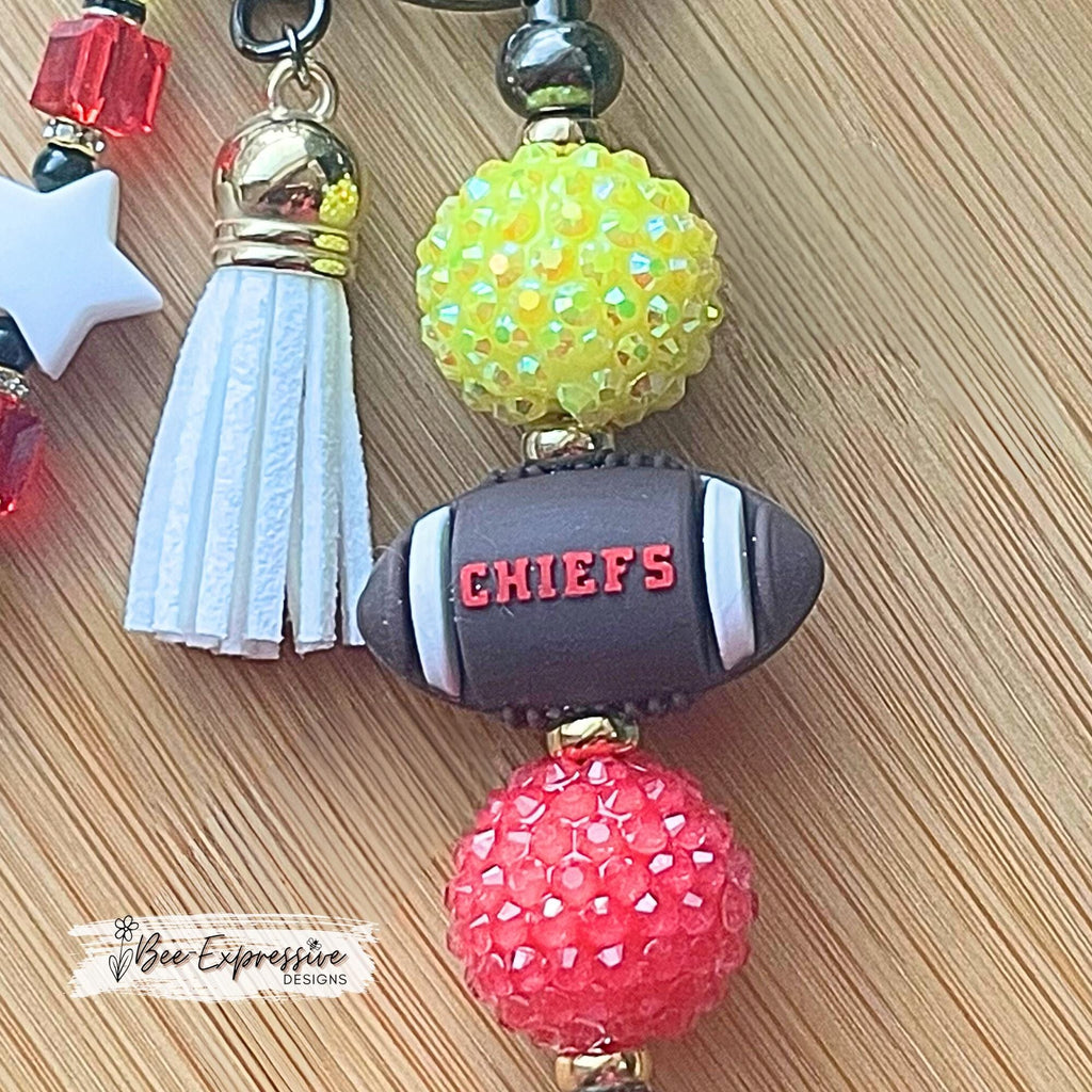 Handmade, FOOTBALL beaded keychain! Silicone football bead says CHIEFS, acrylic chunky beads, gold spacers, beaded tassel, star, heart charm