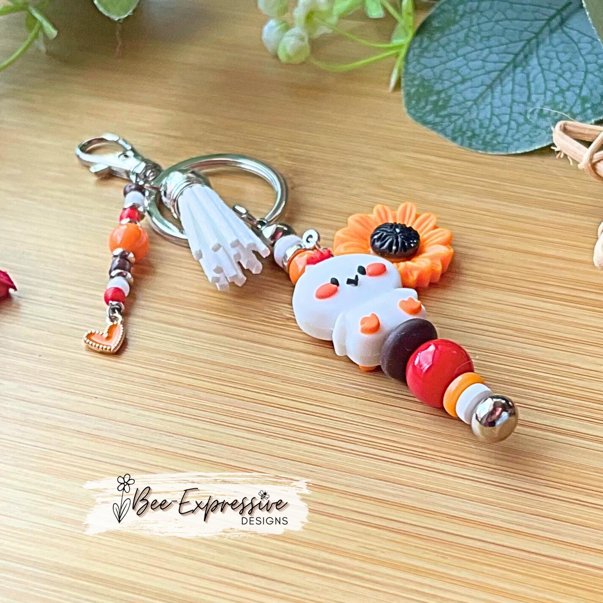 Handmade, silicone CHICKEN keychain! Lobster or swivel clasp, bead bar, acrylic, flower charm, spacers, beaded tassel with a heart charm!