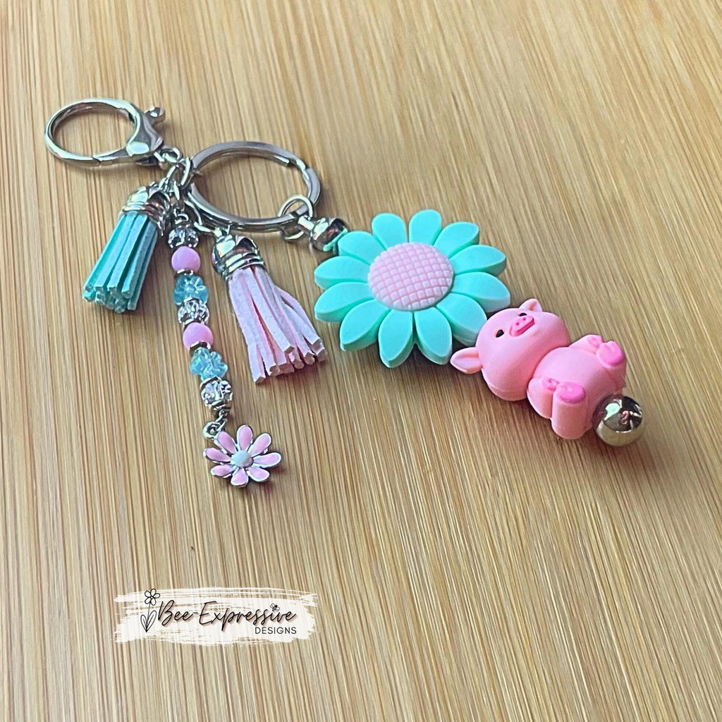 Handmade, silicone 3D PIG & SUNFLOWER keychain! Lobster clasp, bead bar, alloy, acrylic, beaded tassel with flowers, pink daisy flower charm