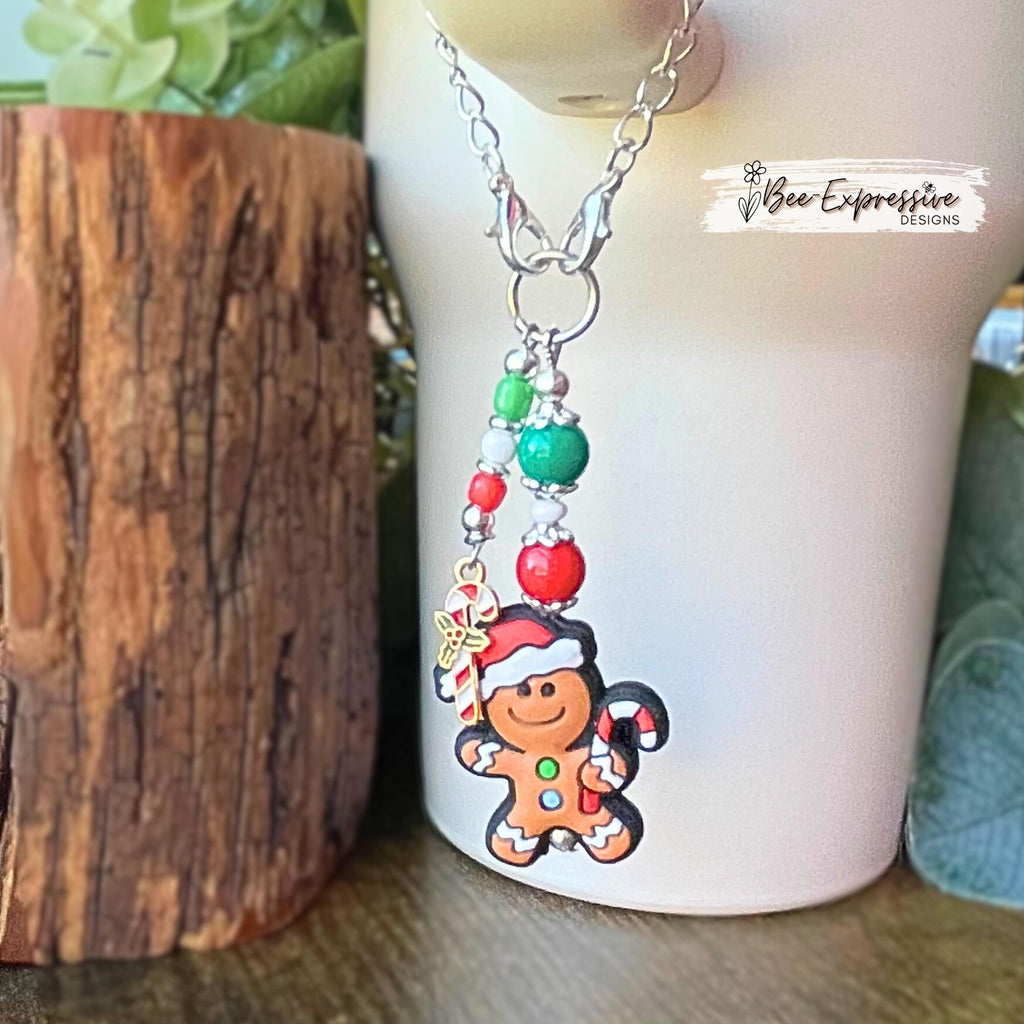Handmade, unique GINGERBREAD man Christmas tumbler charm chain! Acrylic & silicone beads, floral bead caps, beaded tassel, candy cane charm!