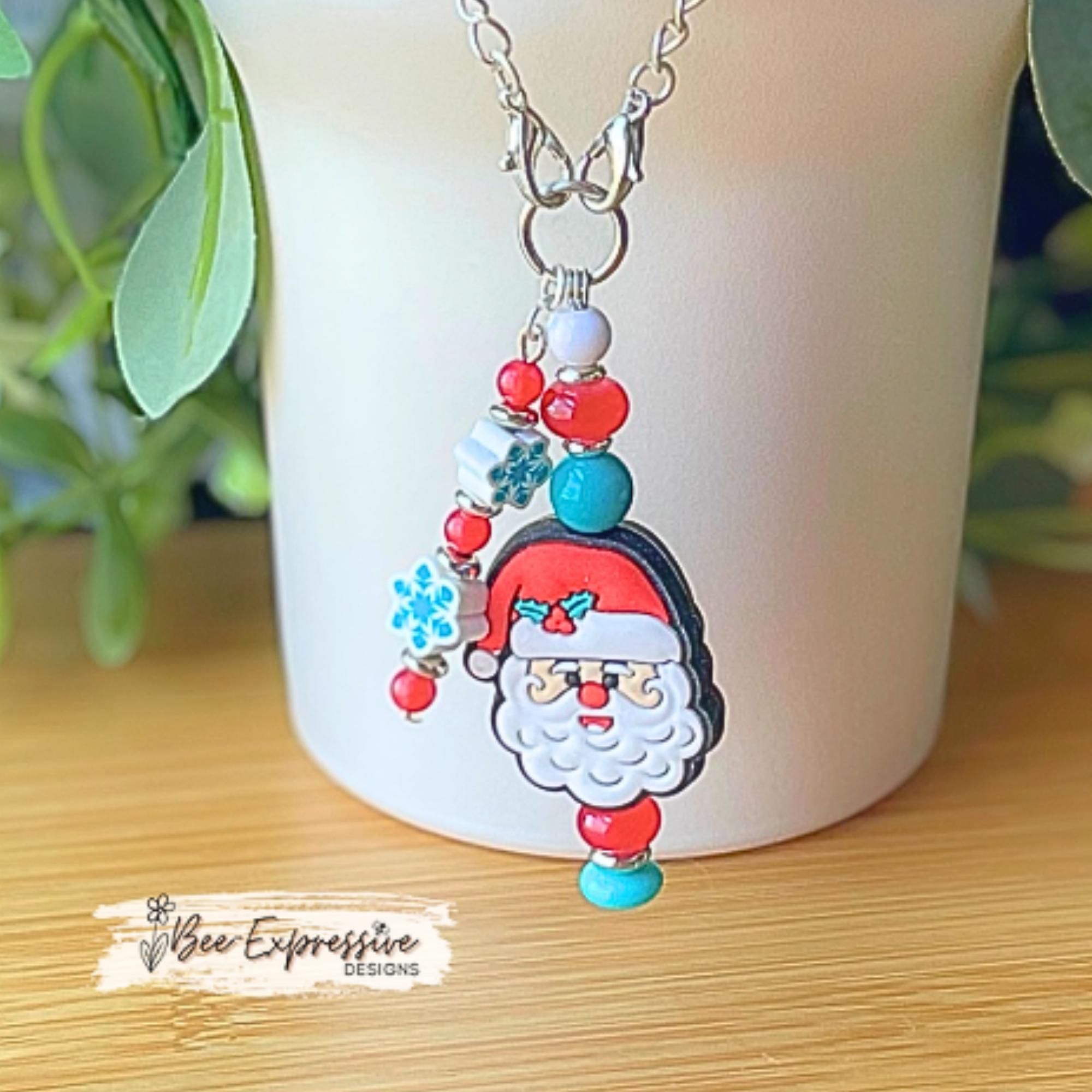 Handmade, unique SANTA CLAUS Christmas tumbler charm chain! Acrylic, glass, silicone beads, spacers, beaded tassel with clay snowflake beads