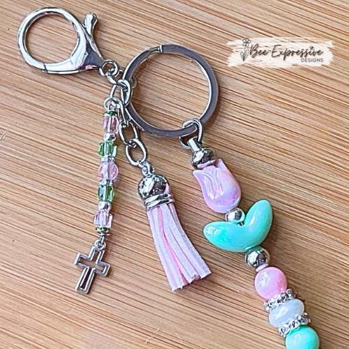 Beautiful, handmade TULIP keychain with iridescent beads! Lobster or swivel clasp, rhinestone spacers, beaded tassel with metal cross charm!