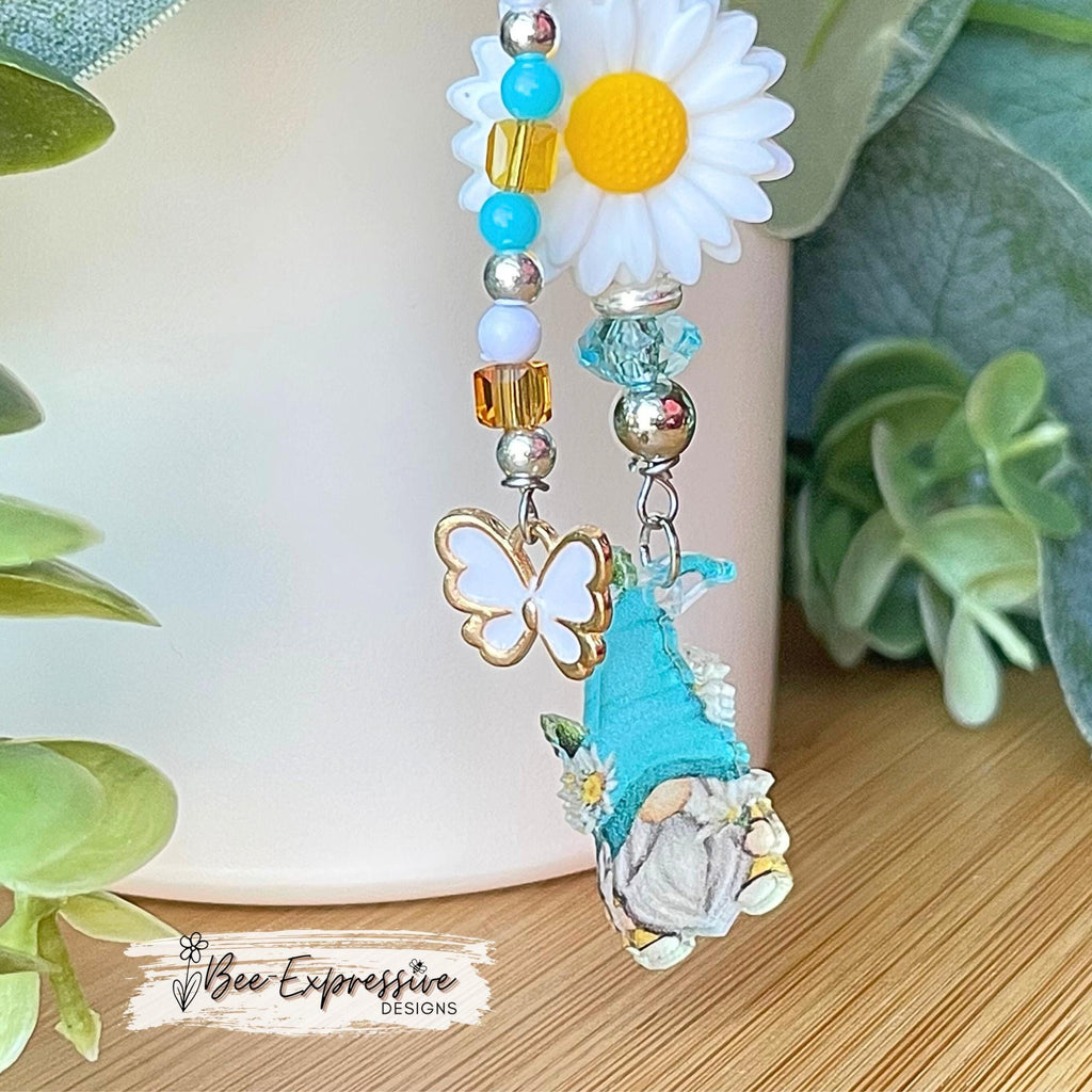 Acrylic gnome charm and silicone daisy flower, tumbler charm chain! Beaded tassel with transparent beads and white butterfly charm pendant!