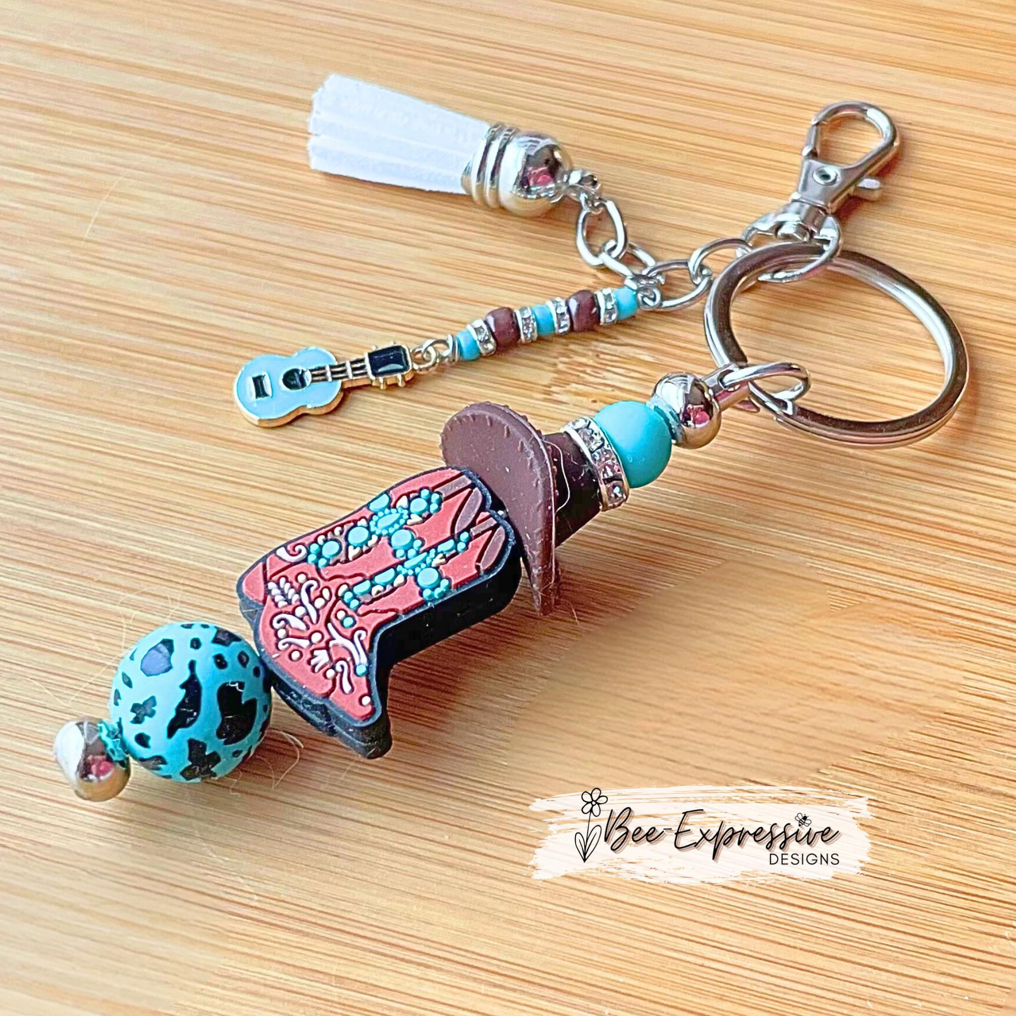Beaded, western boots & cowboy HAT, keychain! Swivel clasp, silicone beads, animal print bead, acrylic beaded tassel with a guitar charm!