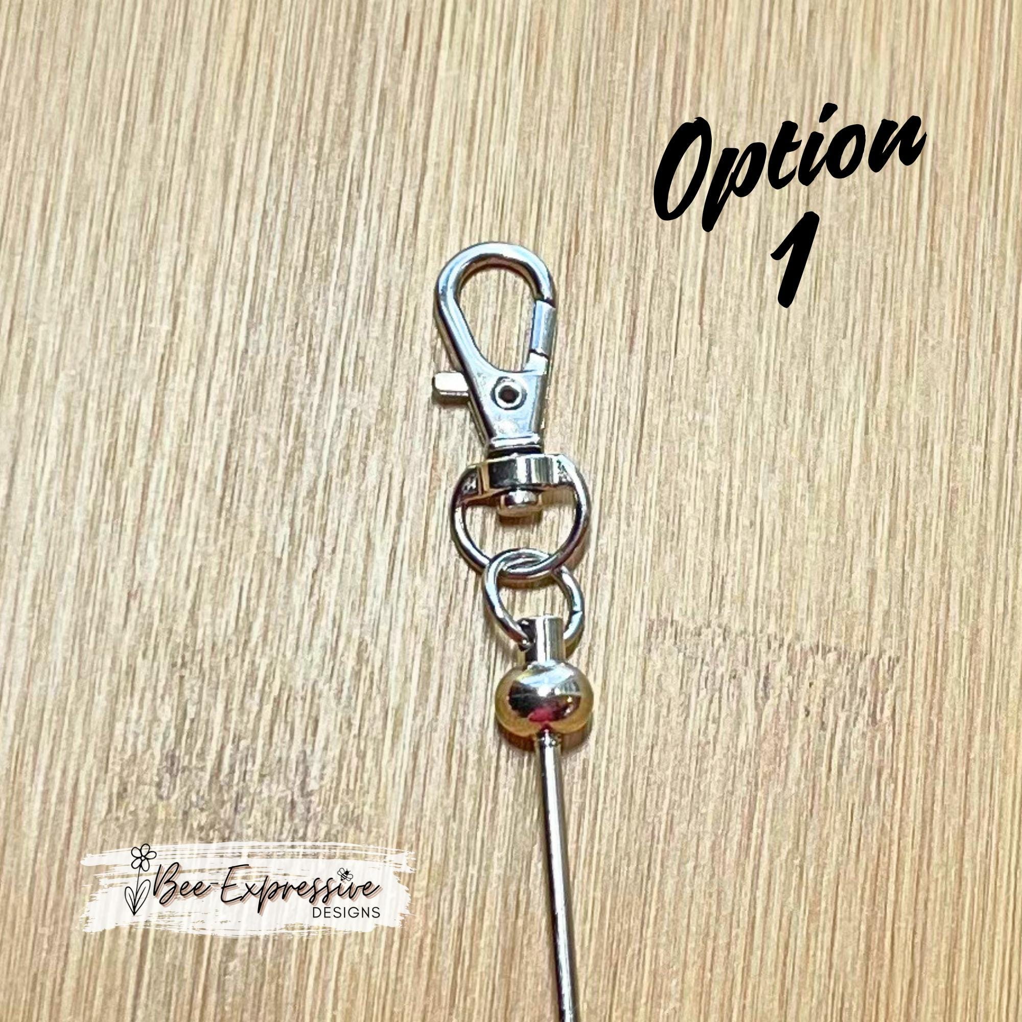 Beautiful, handmade TULIP keychain with iridescent beads! Lobster or swivel clasp, rhinestone spacers, beaded tassel with metal cross charm!