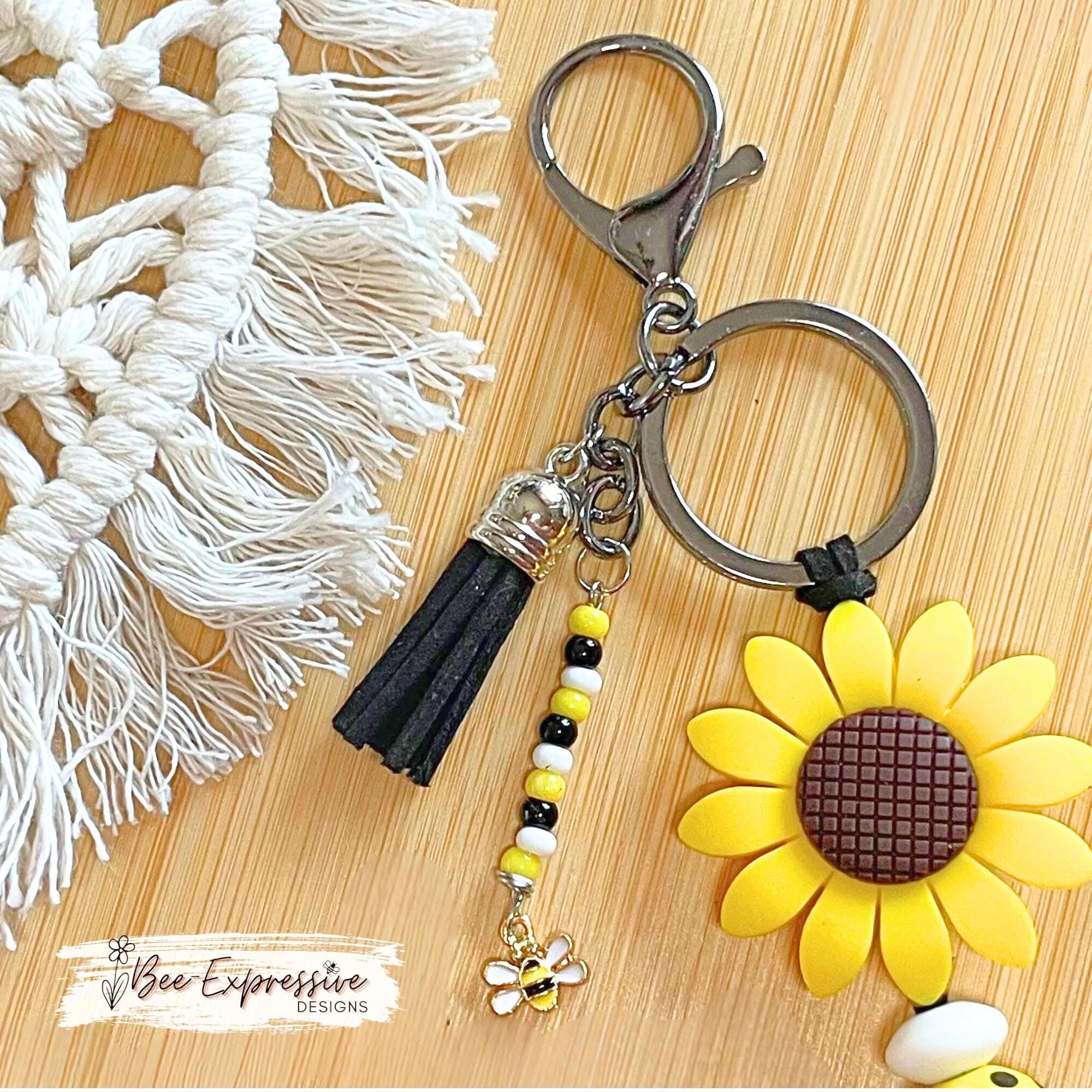Beaded, BEE 4x4 keychain!  Lobster or swivel clasp, suede cord,  2” silicone sunflower, wood bee beads, beaded tassel with a bumblebee charm