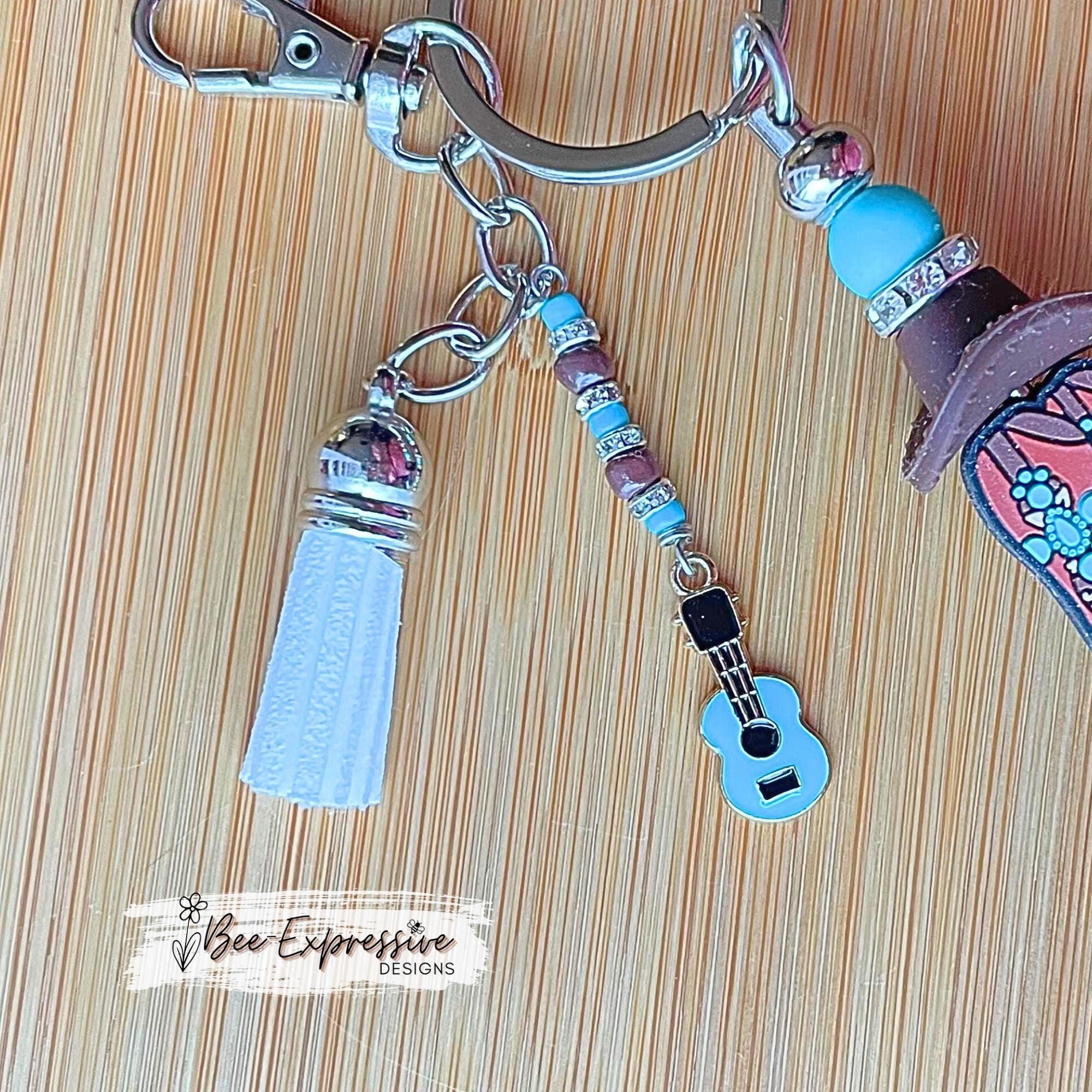 Beaded, western boots & cowboy HAT, keychain! Swivel clasp, silicone beads, animal print bead, acrylic beaded tassel with a guitar charm!