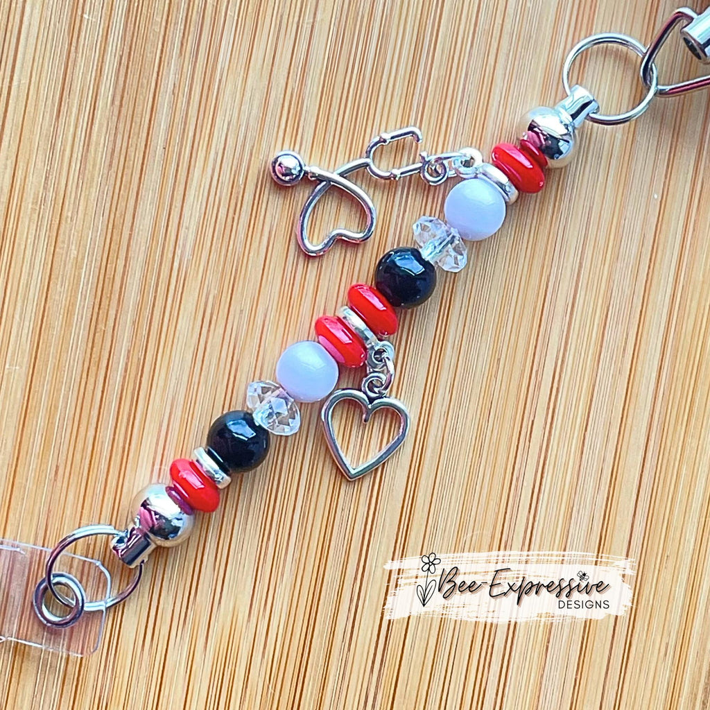 Nurse, beaded badge reel! Metal clip and pull cable, silicone nurse appliqué, a beaded bar with acrylic beads, stethoscope & heart charms!