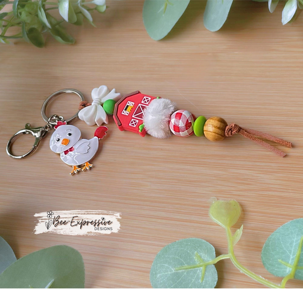 Silicone barn & bow keychain witch chicken charm! Lobster or swivel clasp, suede cord, fuzzy bead, gingham, wood beads, 2” chicken charm!