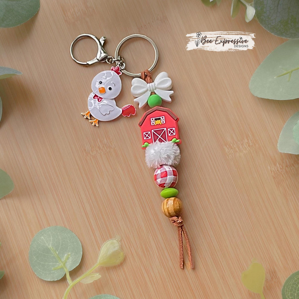 Silicone barn & bow keychain witch chicken charm! Lobster or swivel clasp, suede cord, fuzzy bead, gingham, wood beads, 2” chicken charm!