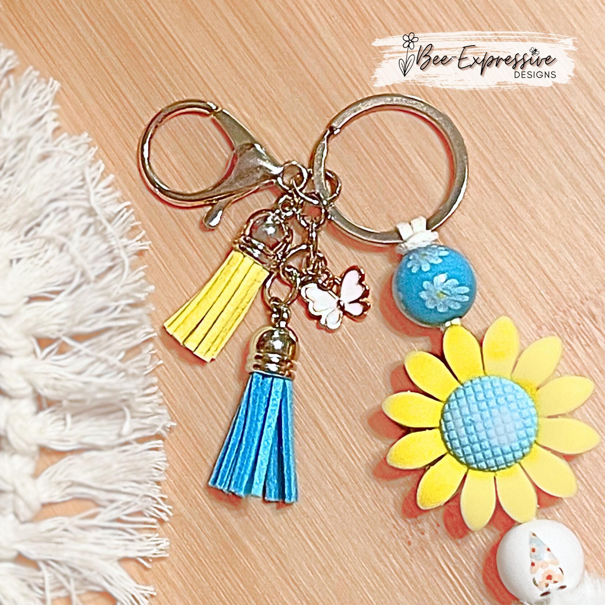 Beaded, silicone SUNFLOWER gnome keychain! Lobster or swivel clasp, suede cord, floral wood beads, furry bead, tassels, butterfly charm!