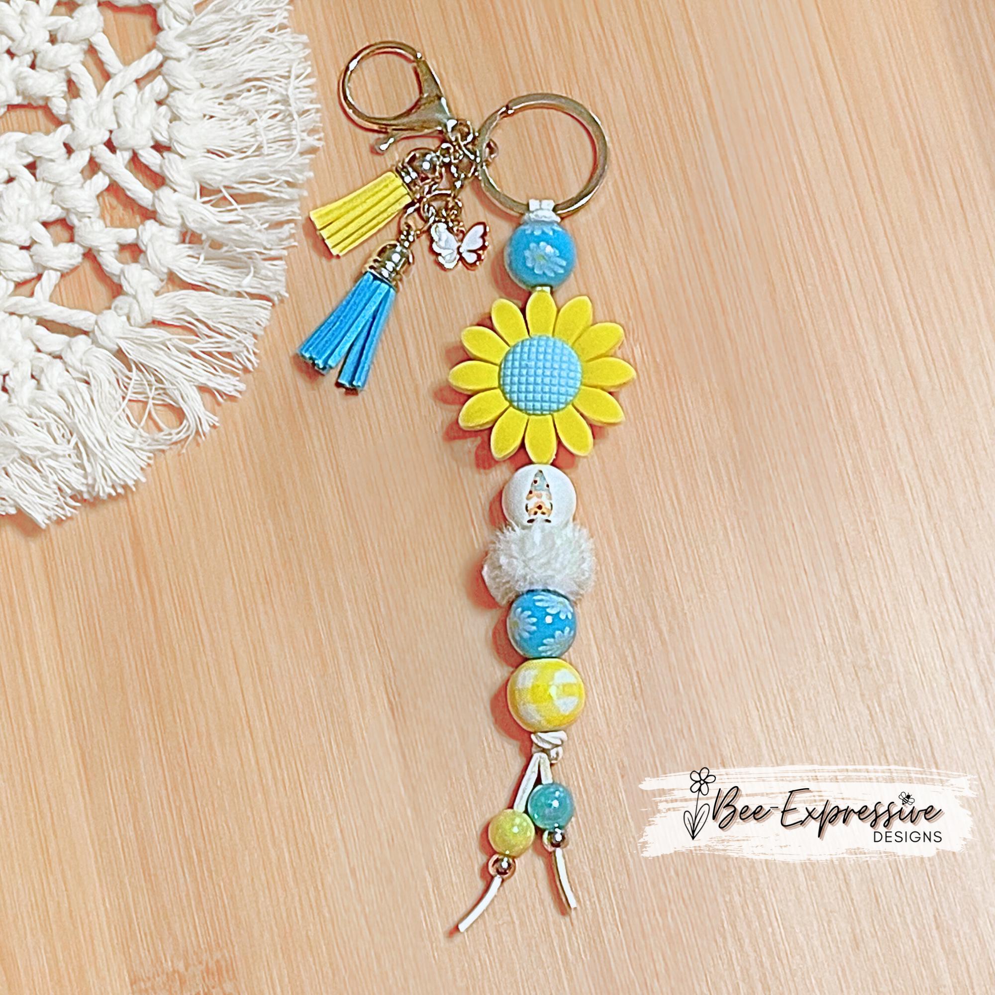 Beaded, silicone SUNFLOWER gnome keychain! Lobster or swivel clasp, suede cord, floral wood beads, furry bead, tassels, butterfly charm!