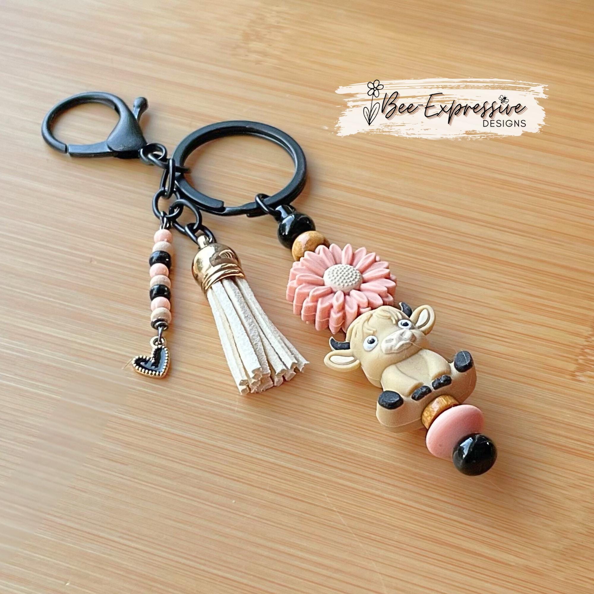 Beige 3D COW, BULL, beaded keychain! Lobster clasp, bead bar, daisy flower bead, silicone & wood beads, beaded tassel with black heart charm