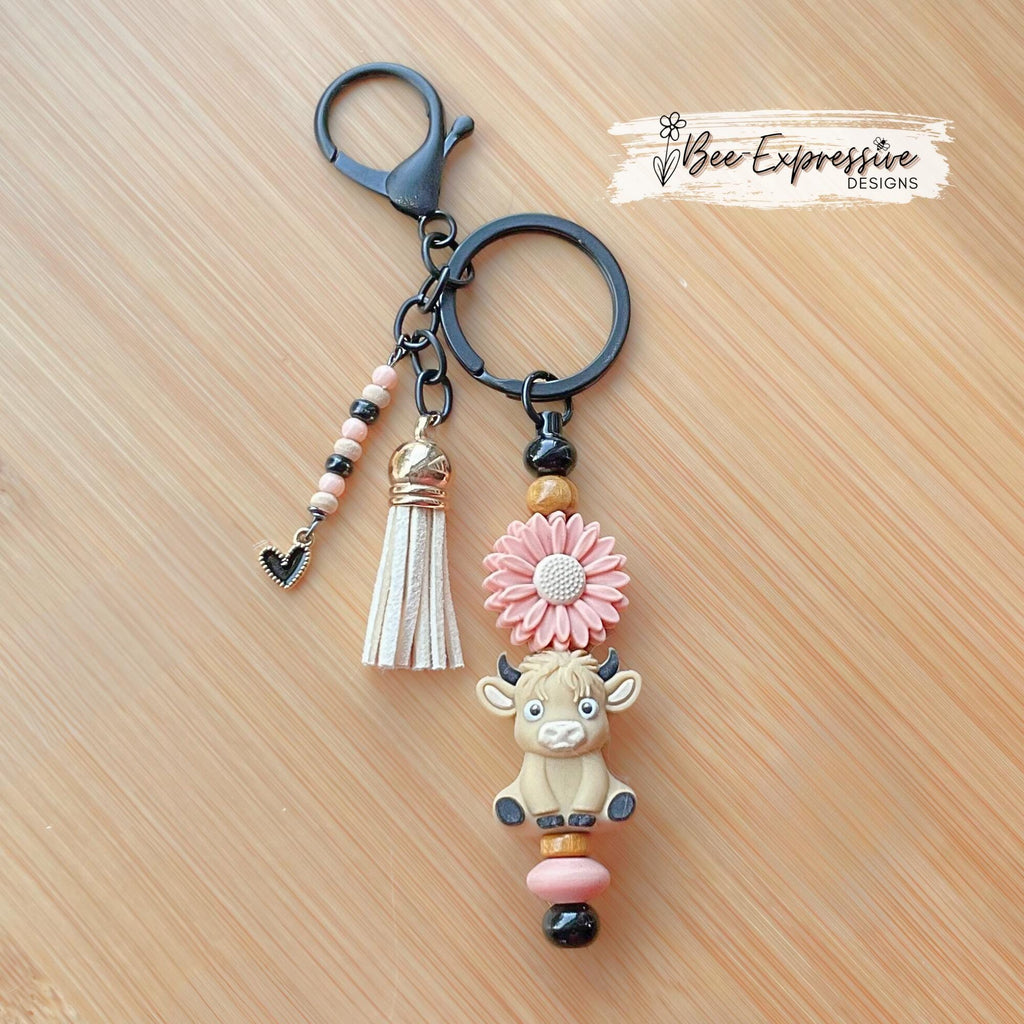 Beige 3D COW, BULL, beaded keychain! Lobster clasp, bead bar, daisy flower bead, silicone & wood beads, beaded tassel with black heart charm