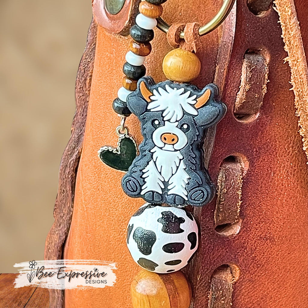 Cow keychain, bag accessory! Swivel clasp with or without a keyring, wood and silicone beads, cow print bead, beaded tassel with heart charm