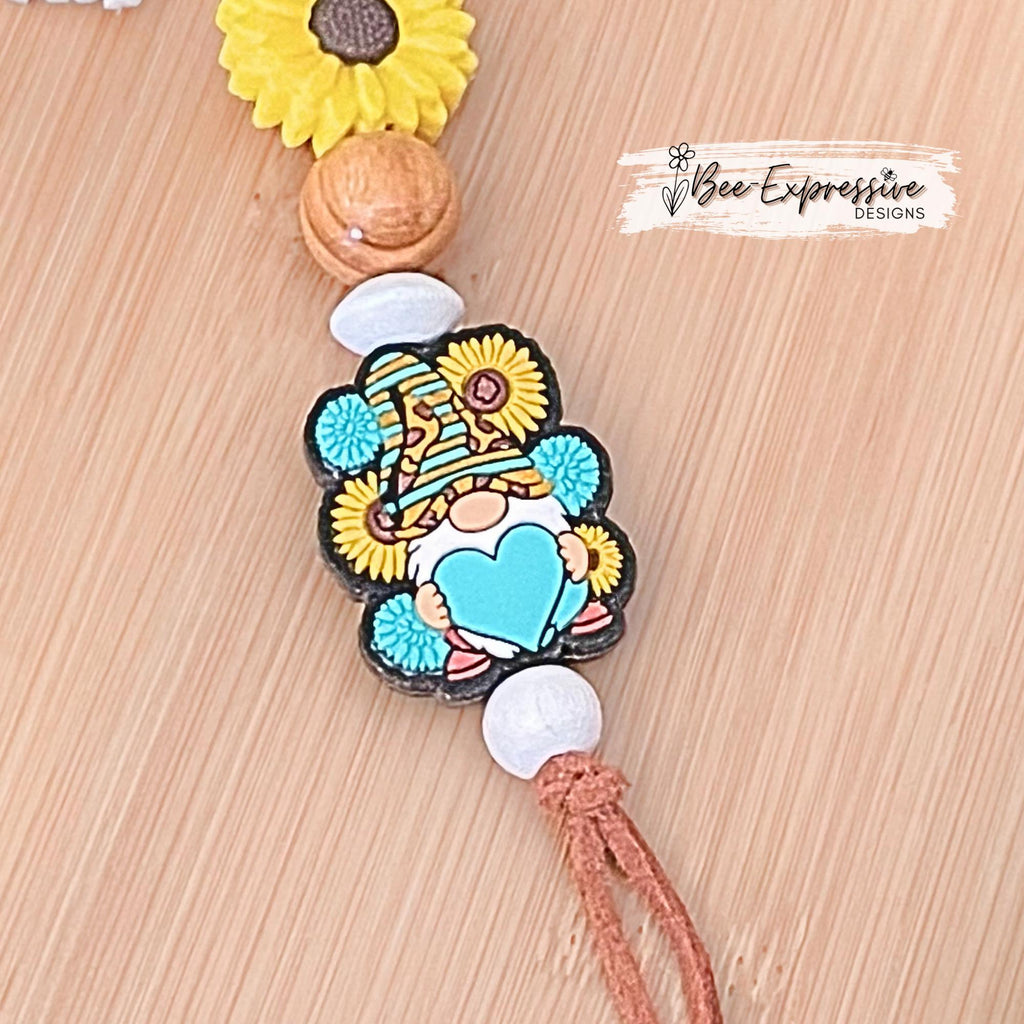 SUNFLOWER / GNOME, keychain! Yellow lobster clasp, keyring, suede cord, wood beads, beaded tassel, with a flower charm!